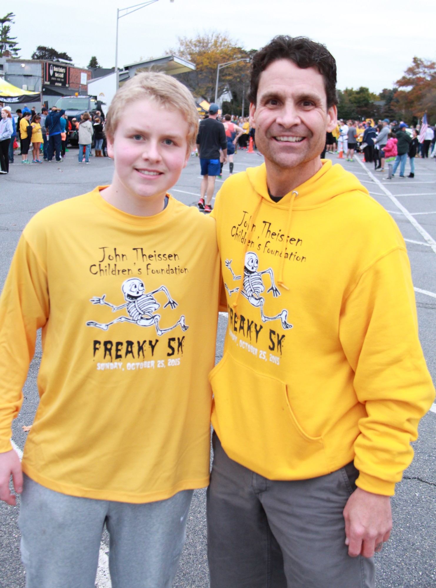 John Theissen, right, joined by his son, John, was the organizer of the race which drew more than 600 participants.