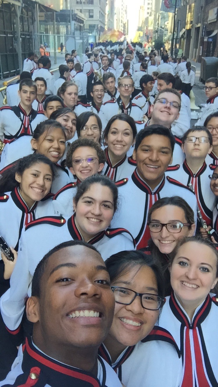 The W.T. Clarke marching band, shown taking a selfie on parade day earlier this month, earned its highest placement ever — second — in just six years of competing in the New York City holiday event.