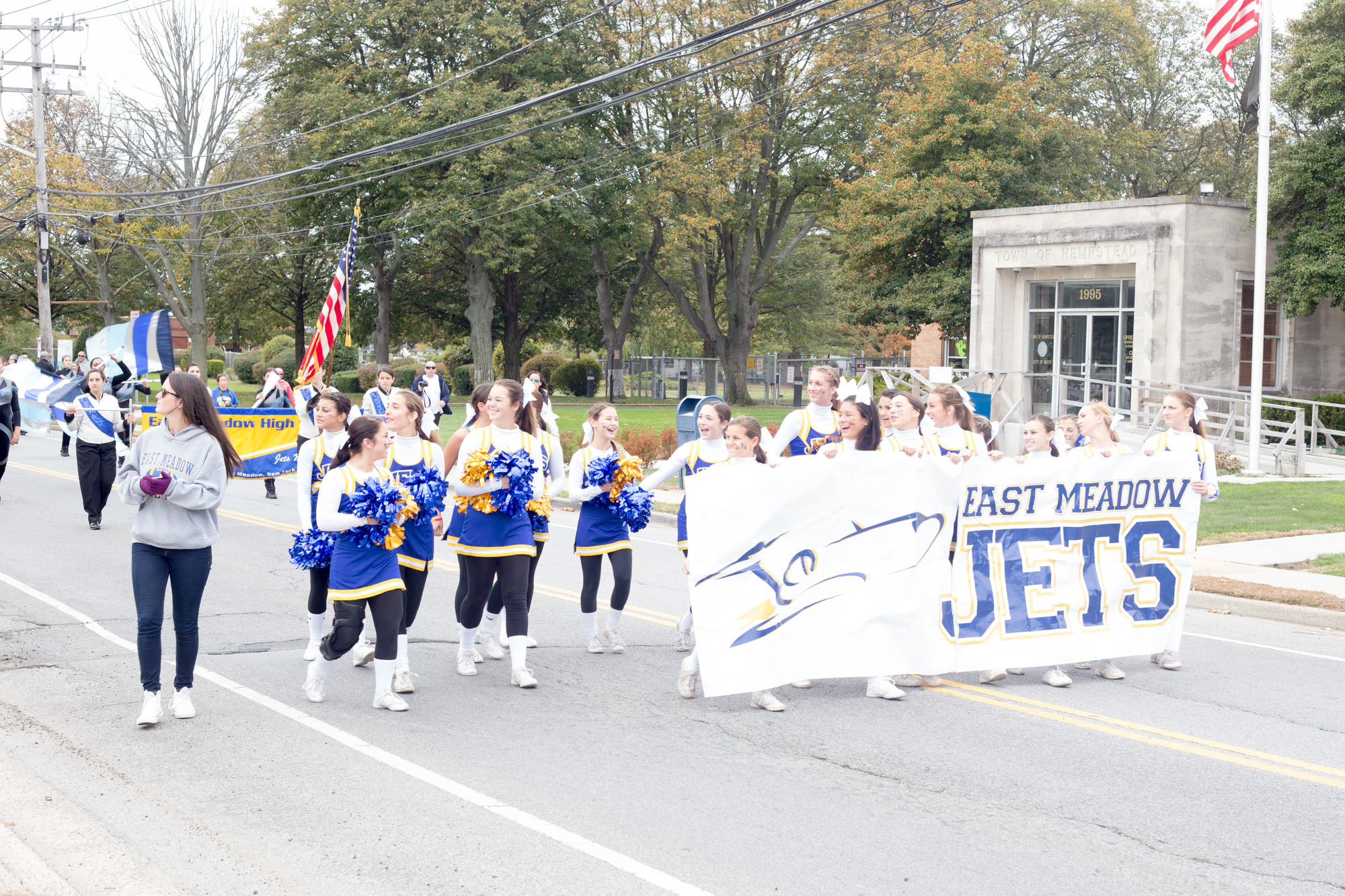East meadow High School cheerleaders led the parade’s procession from Veterans Memorial Park to the high school last Saturday.