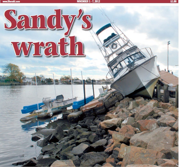 The Cover of the Herald’s Nov. 1-7, 2012 issue, featured a photo taken along the canal in Bay Park. Other boats were found marooned on residents’ lawns a few blocks from the canal.