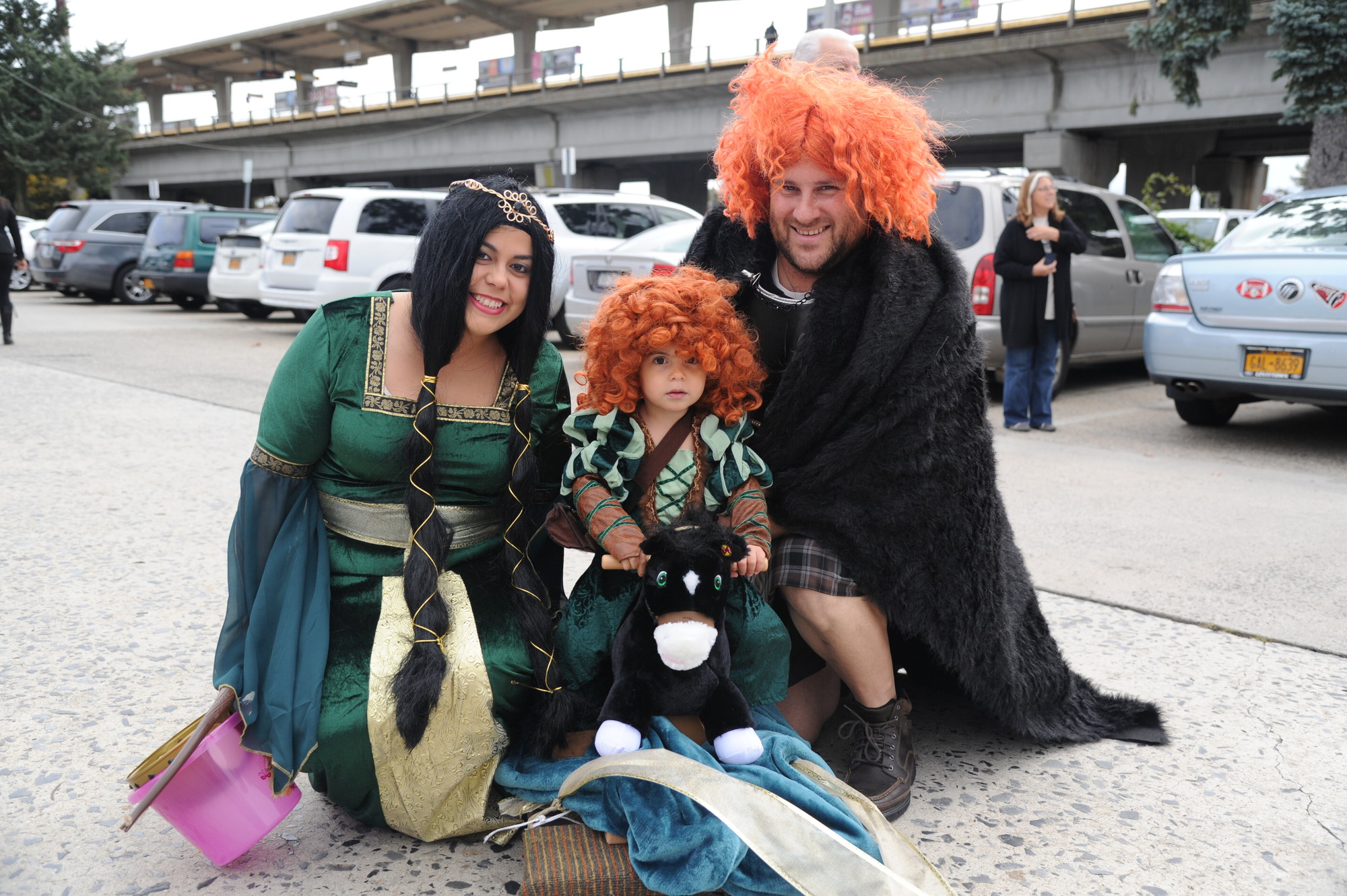 The Weiss family based their costumes on the Disney film “Brave.” Kemely dressed as Queen Eleanor, while Philip was King Furgus and young Leyla was Merida.