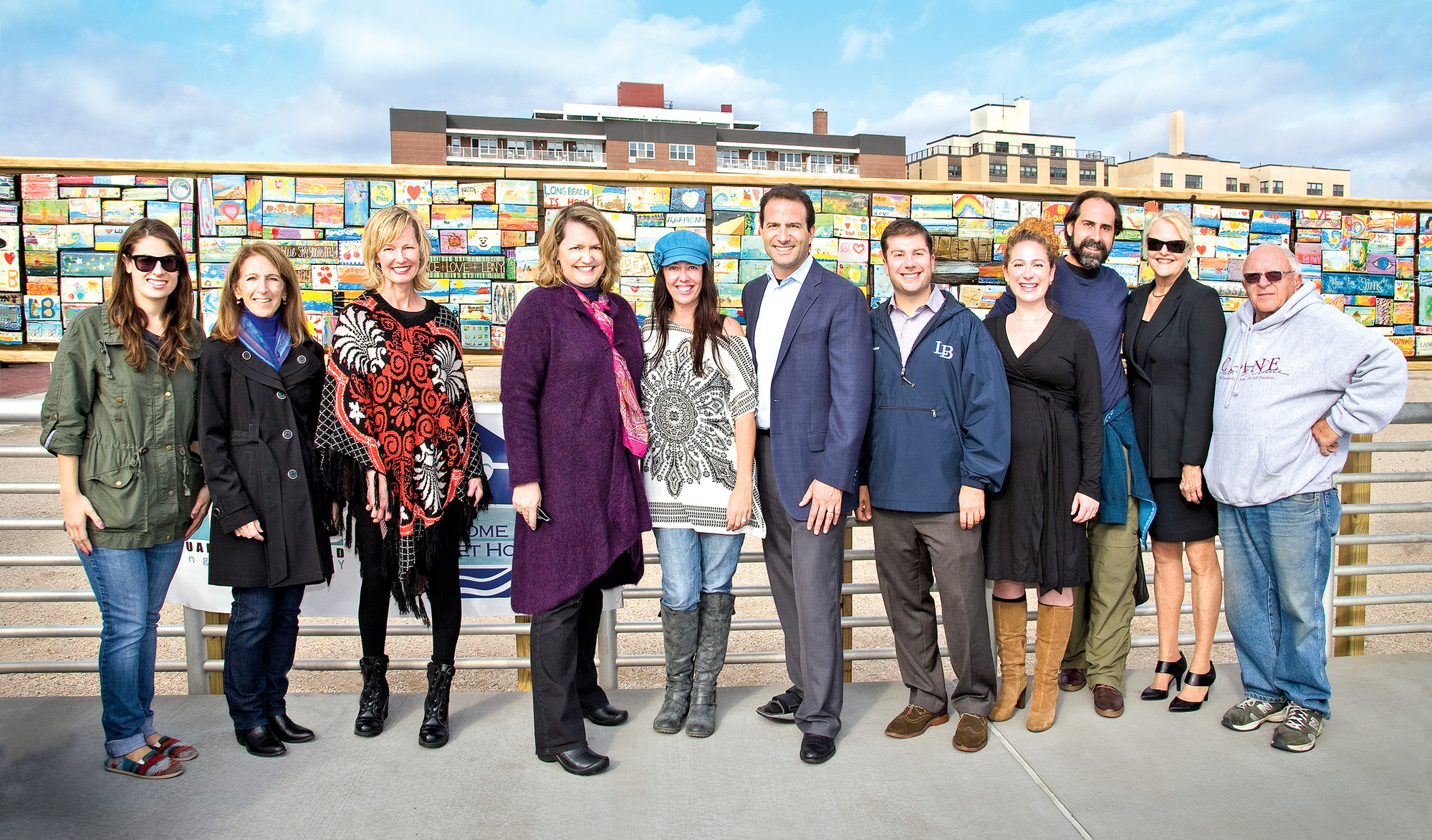 West End Artist Abby Road, far left, City Council Vice President Fran Adelson, Councilwoman Eileen Goggin, West End Arts Vice President Elizabeth Connolly, West End Arts President Jennifer Creed Aly, Councilman Anthony Eramo, City Manager Jack Schnirman and his wife Joanie, Council for the Arts President Arthur Adair and Council for the Arts members Johanna Mathieson and Edward Kennedy.