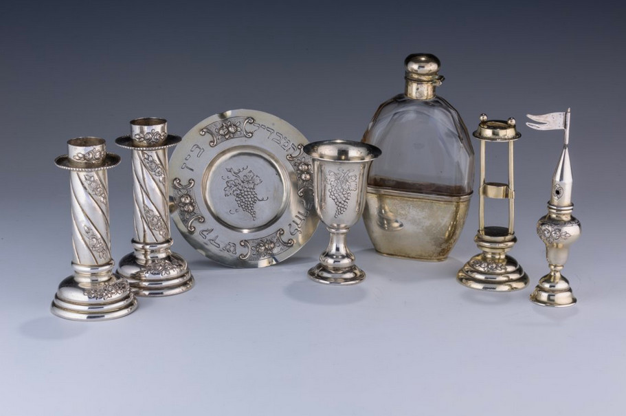 An 1880 traveling Sabbath set with candlesticks and Kiddush cup will be auctioned at J. Greenstein & Co., Inc. It is from the collection of Jakob Michael, a lifelong collector of Jewish ritual art.