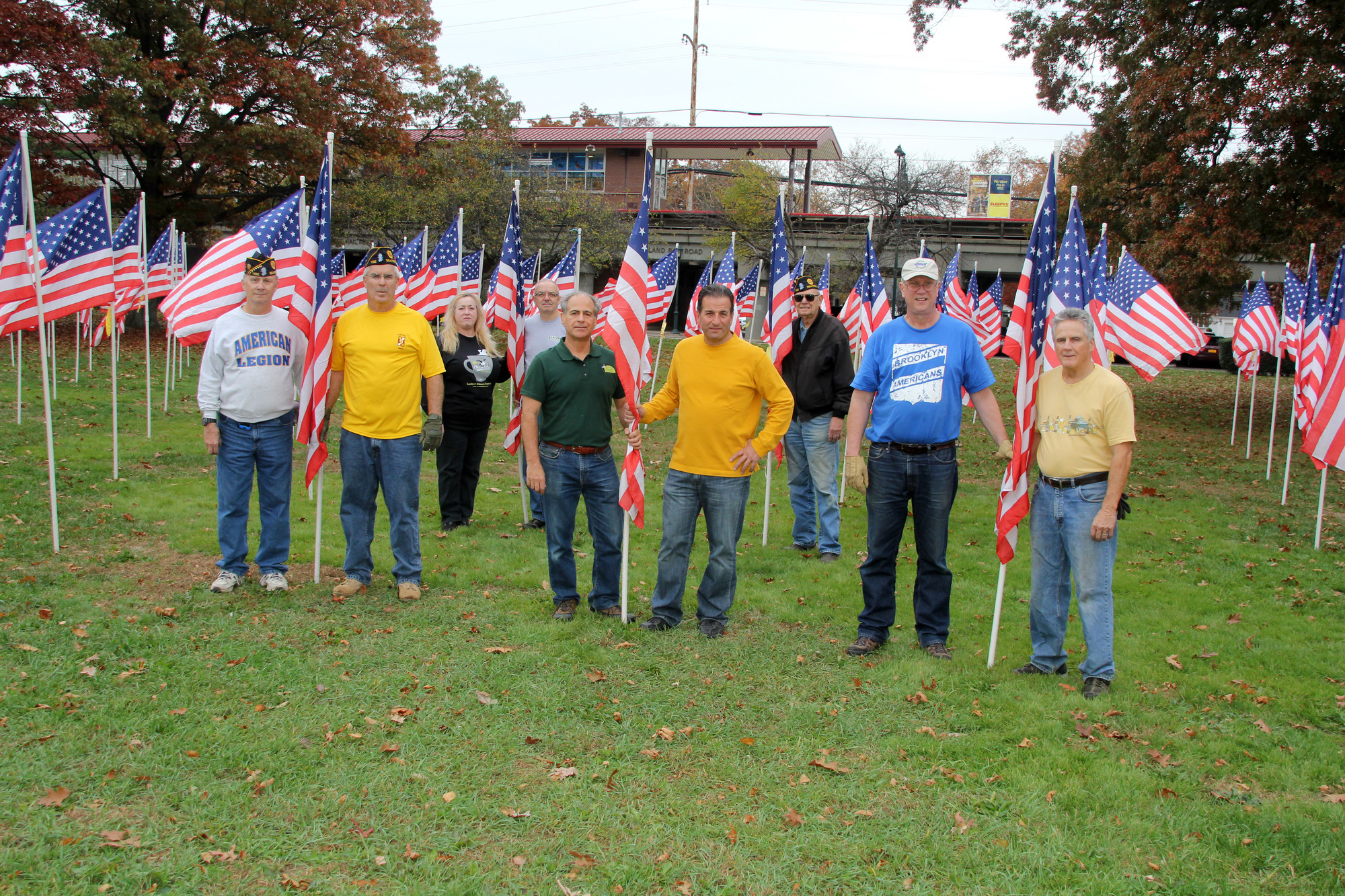 Members of the Seaford Wellness Council and Seaford American Legion Post 1132 set up dozens of American flags in front of the Seaford train station last Saturday morning to create the Field of Honor, an annual tradition in the community in commemoration with Veterans Day.