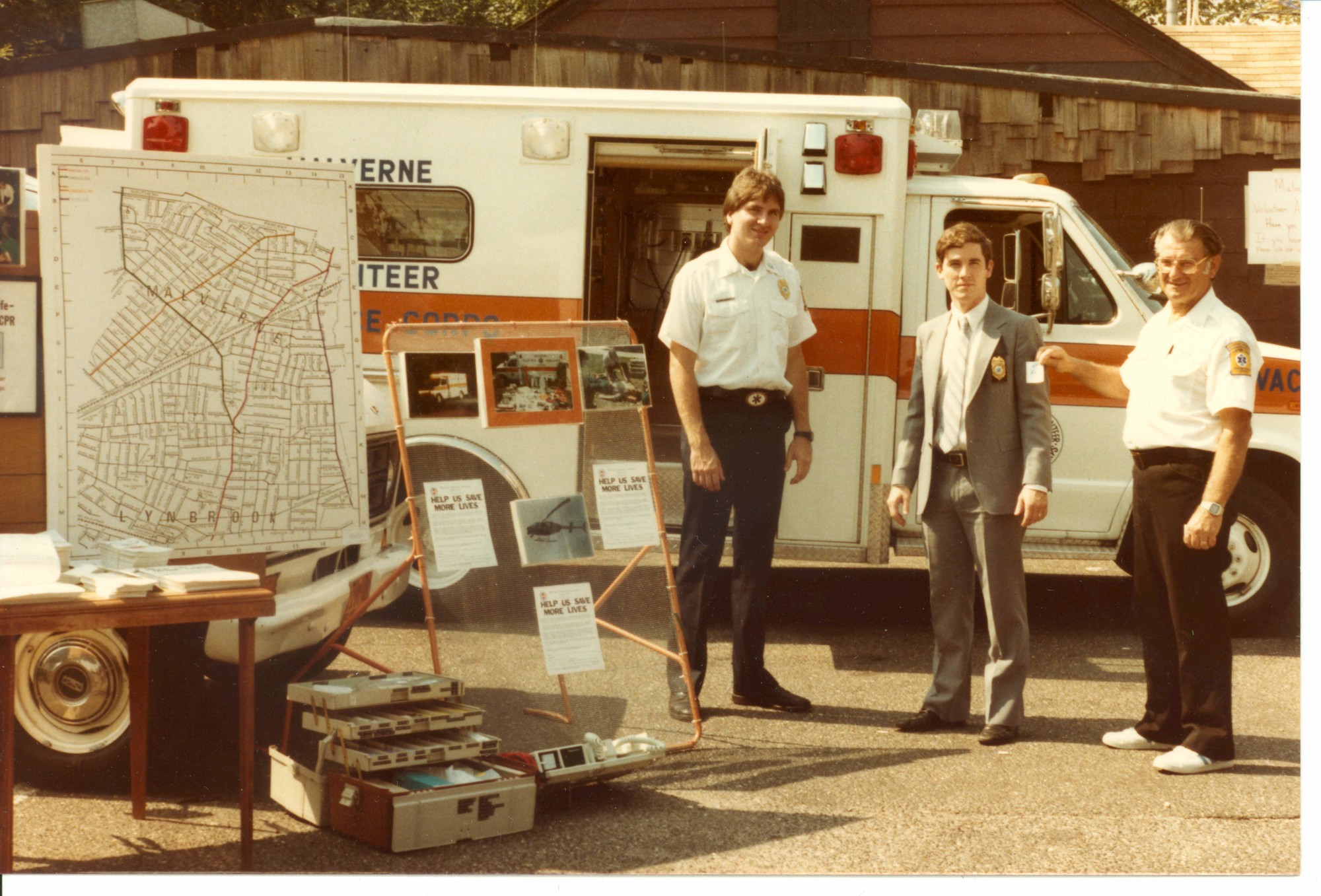 Bill Malone, center, with John Vuini, right, a founding member of the MVAC, and corps member George Jacobsen.