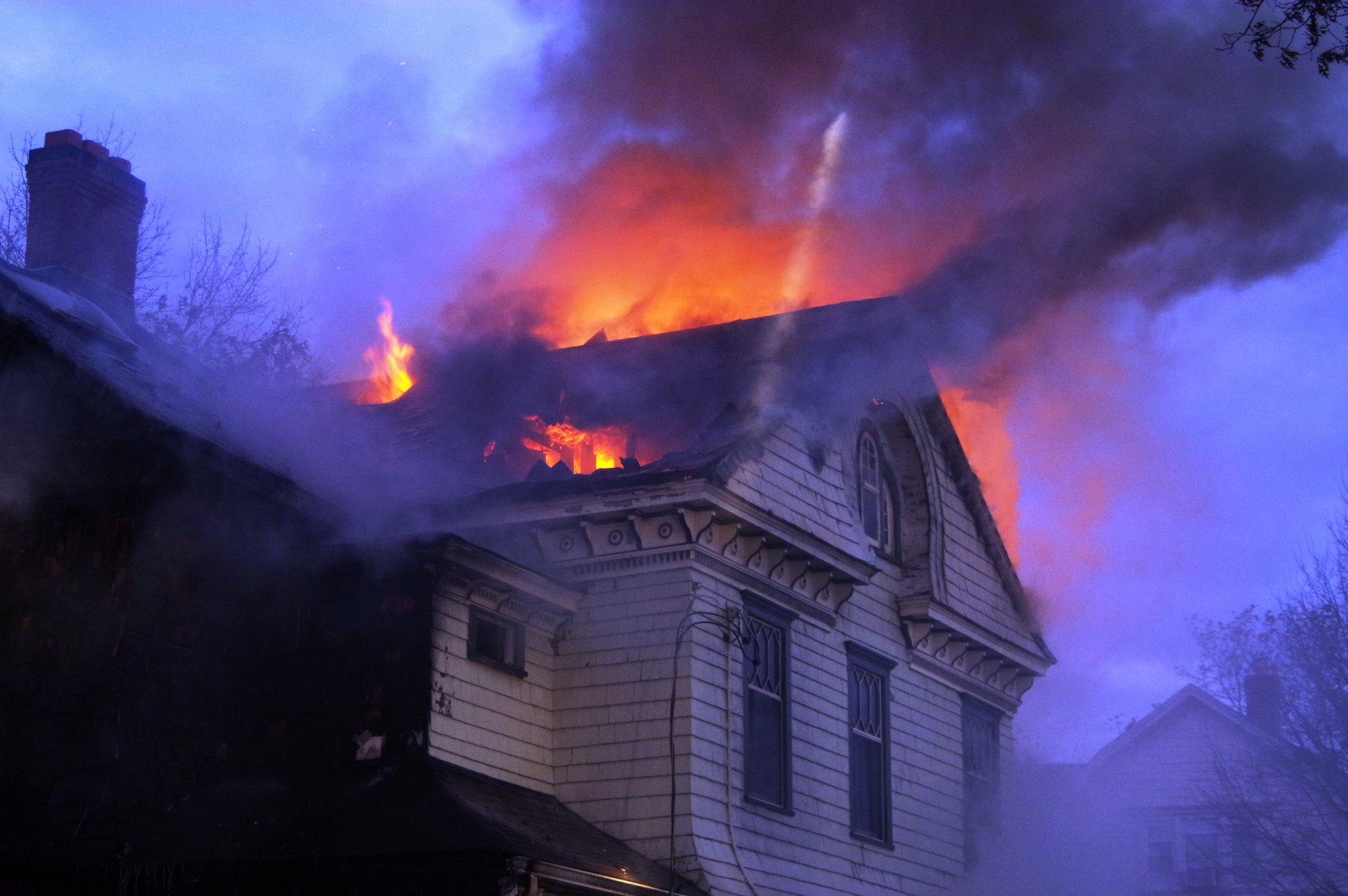 The fire grew rapidly, quickly consuming the entirety of the 85-year-old home.