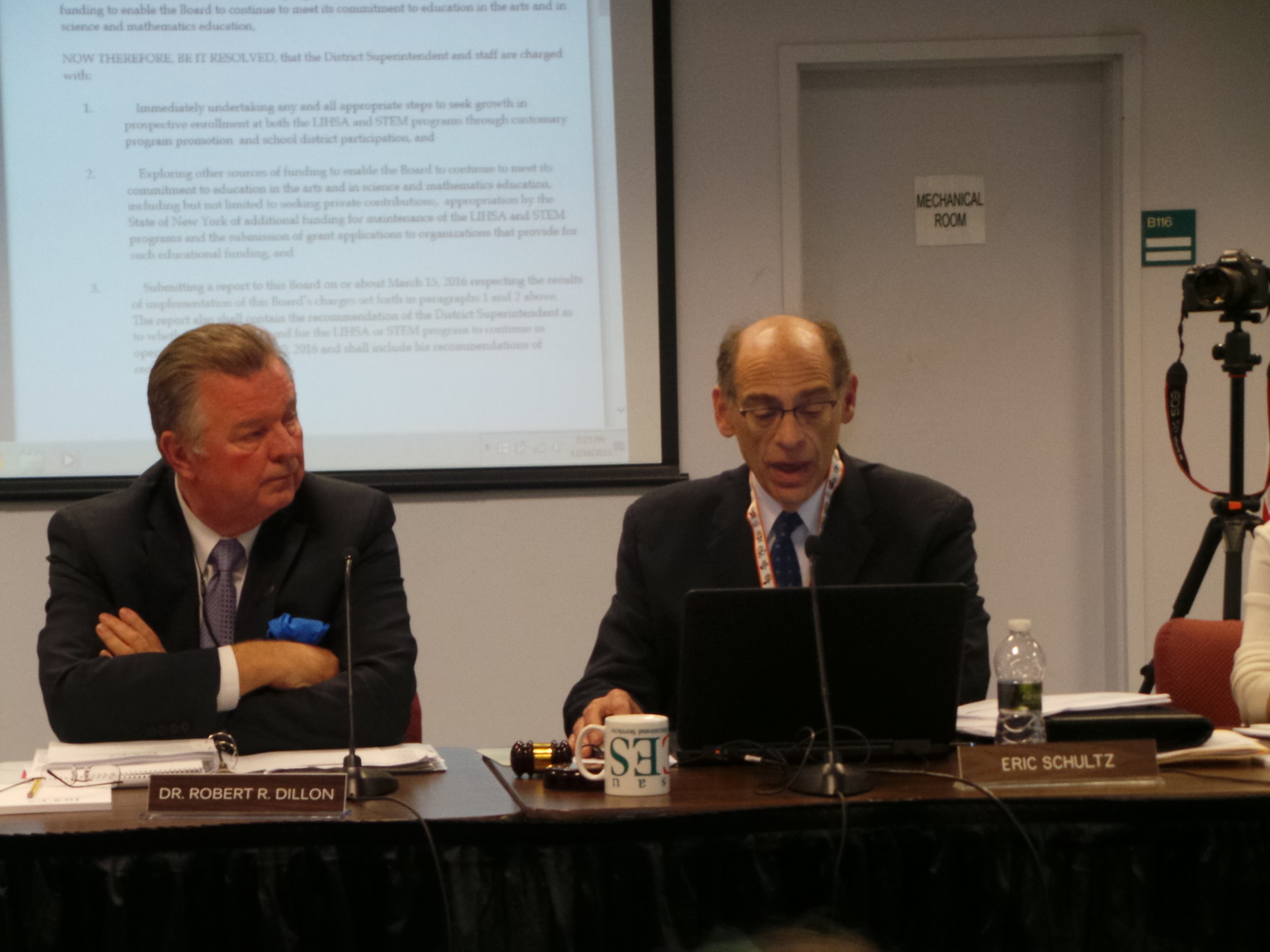 Nassau BOCES President Eric Schultz, right, read a letter from Billy Joel, asking the board to explore other options before closing Long Island High School for the Arts and the Doshi Science, Technology, Engineering and Math Institute.