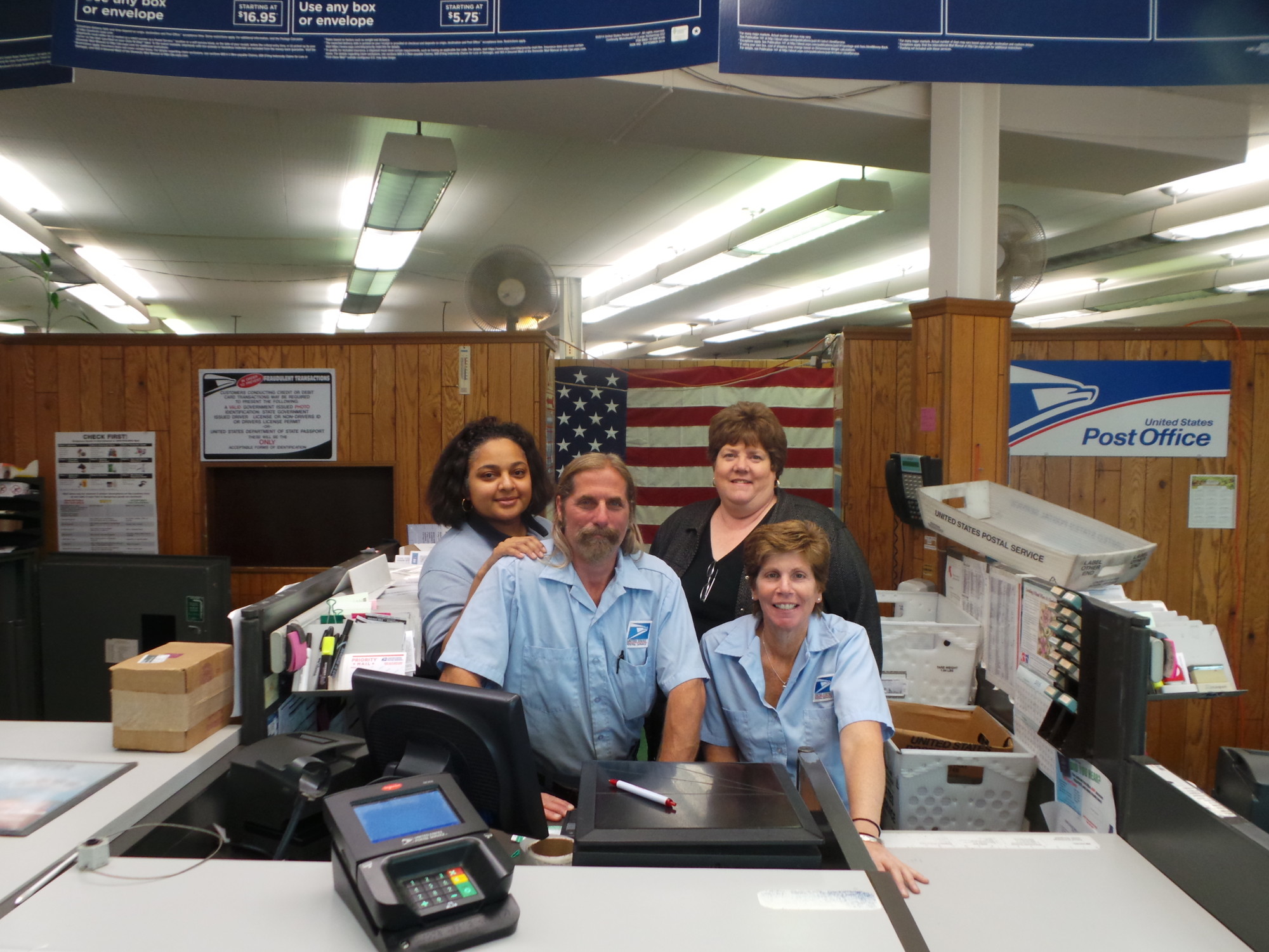 Some of the familiar faces from the Malverne post office include, from left, Sascha Singh, Ed Messina, Elizabeth Kelly and Janet Guido.