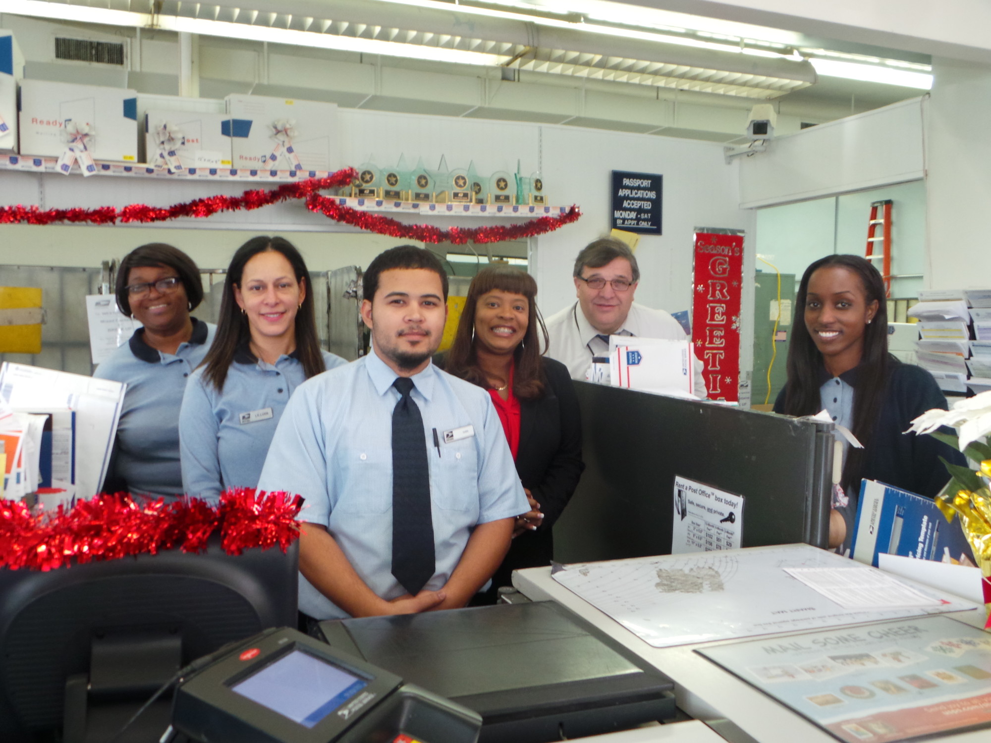 Employees of the West Hempstead Post Office include, from left, Jasmine Rubie, Lillian Torres, Ivan Espinal, Pamela Baker, Vincent Violante and Krisann Forbes.
