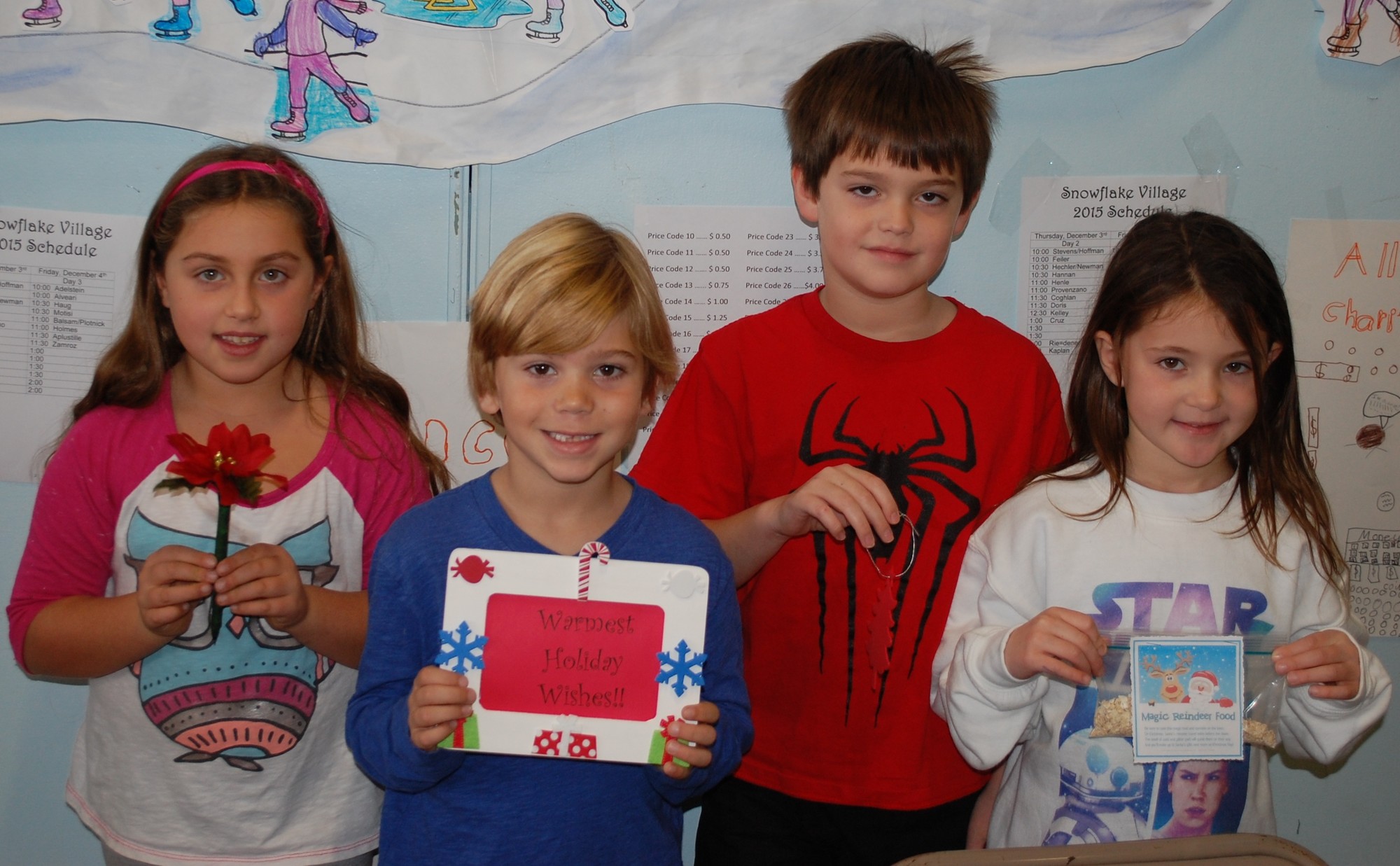 Second graders, from left, Autumn Feitzinger, Peter Barone, Brendan Gough and Caroline Martorana sold hand-made crafts to raise money for charity.