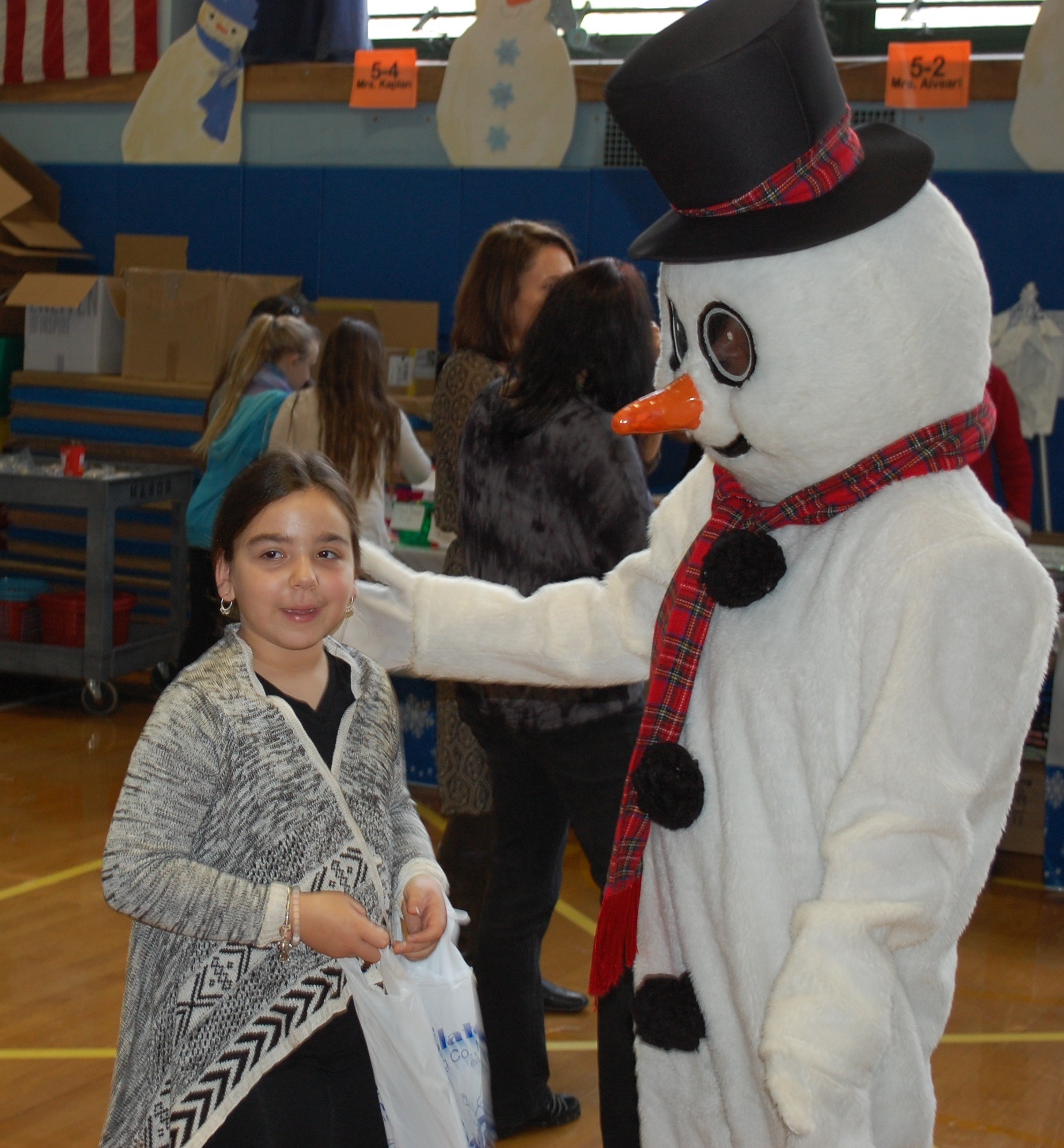 Frosty the Snowman greeted students.