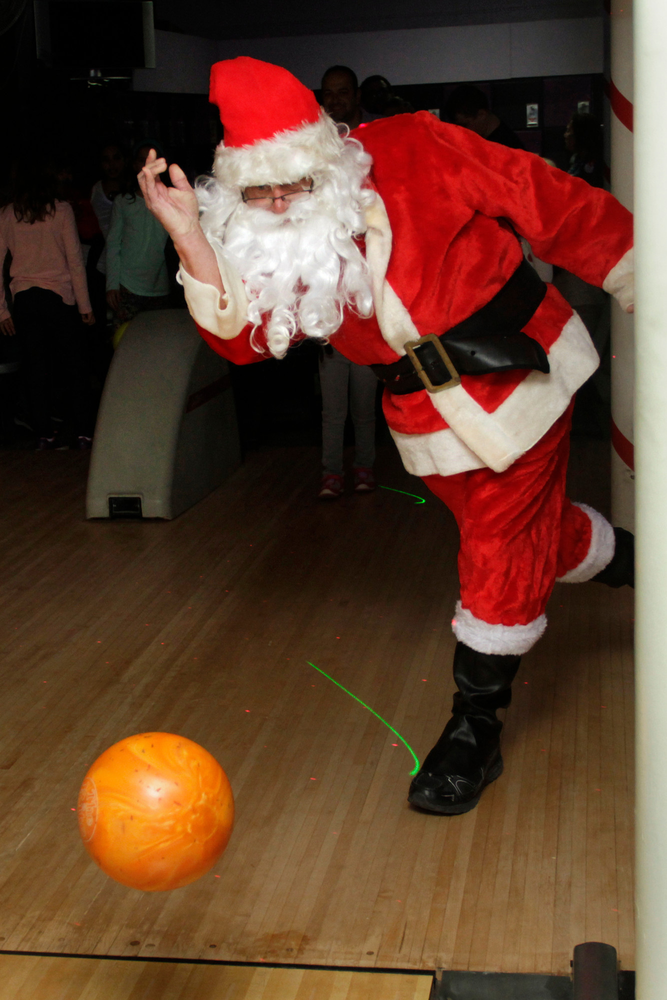 Santa showed some bowling expertise at Sandee Lanes.