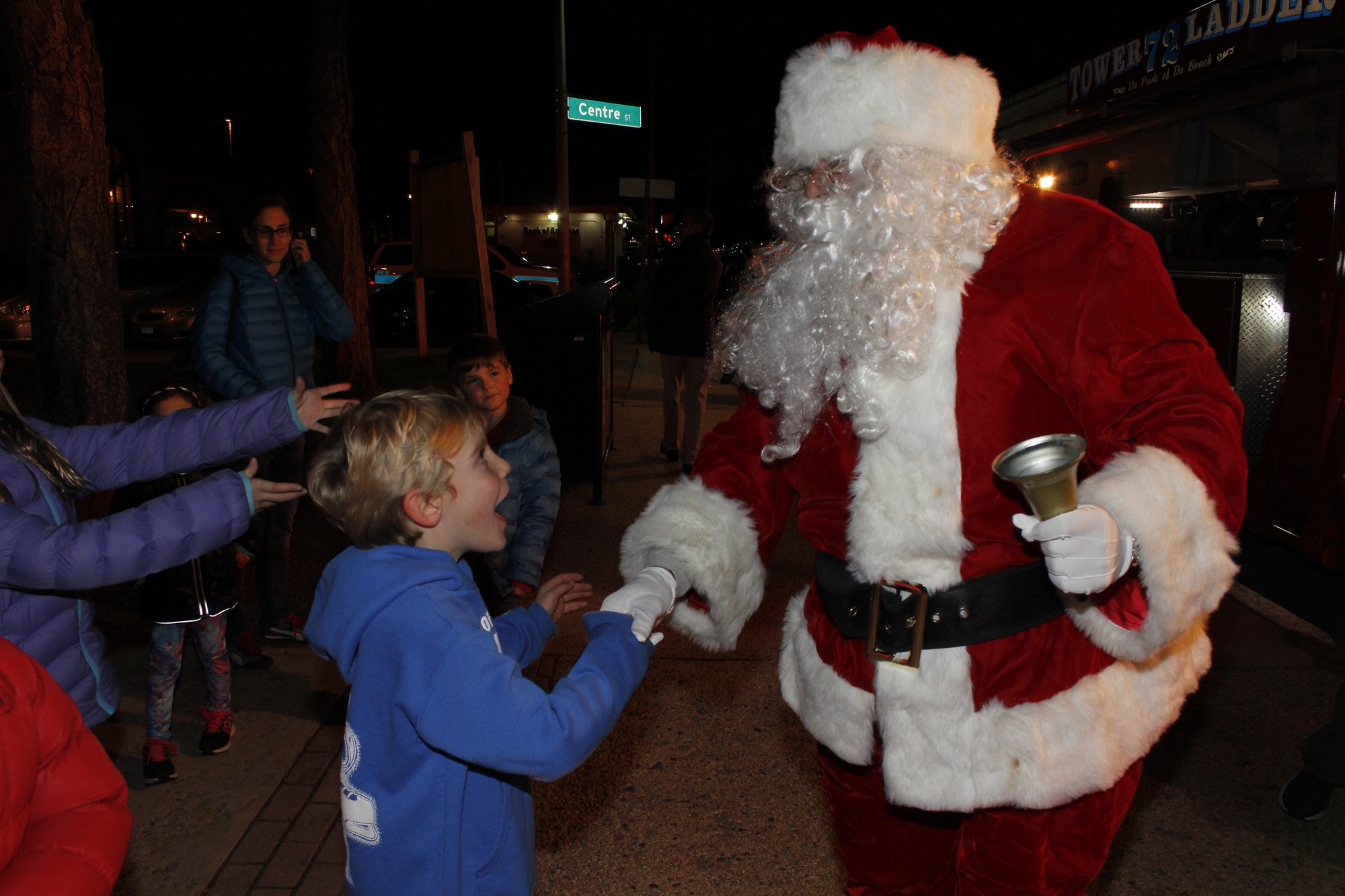Archie Lithgow was the first person to shake Santa’s hand as he stepped off the fire truck at last week's tree lighting.