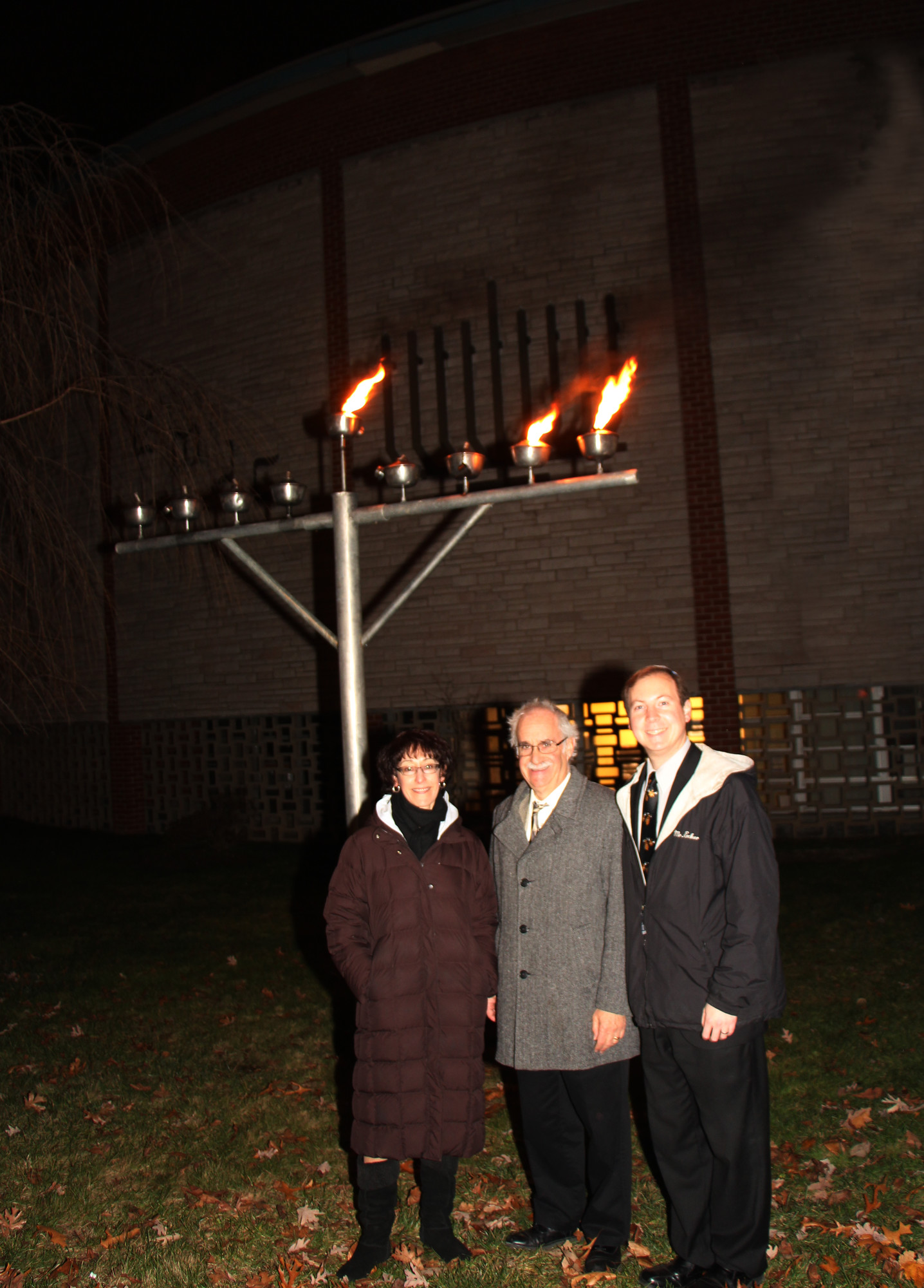 The East Meadow Jewish Center will host menorah lightings throughout Hanukkah. Hebrew School Principal Shira Ornstein, Dr. Ronald Androphy, the temple’s rabbi, and Eckers led the Dec. 7 ceremony.