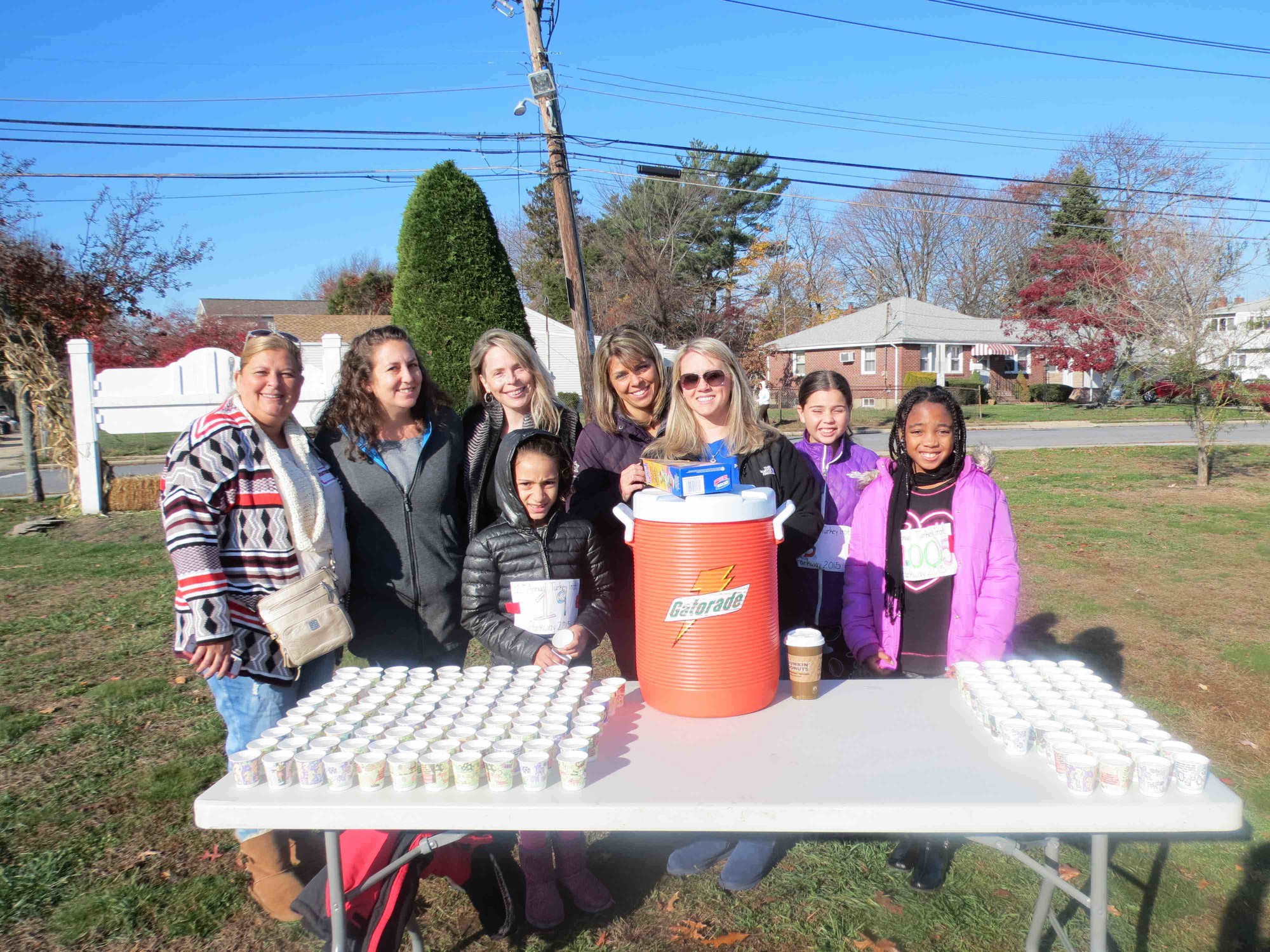 Parkway PTA members cheered the children on and handed them cups of water during the run.
