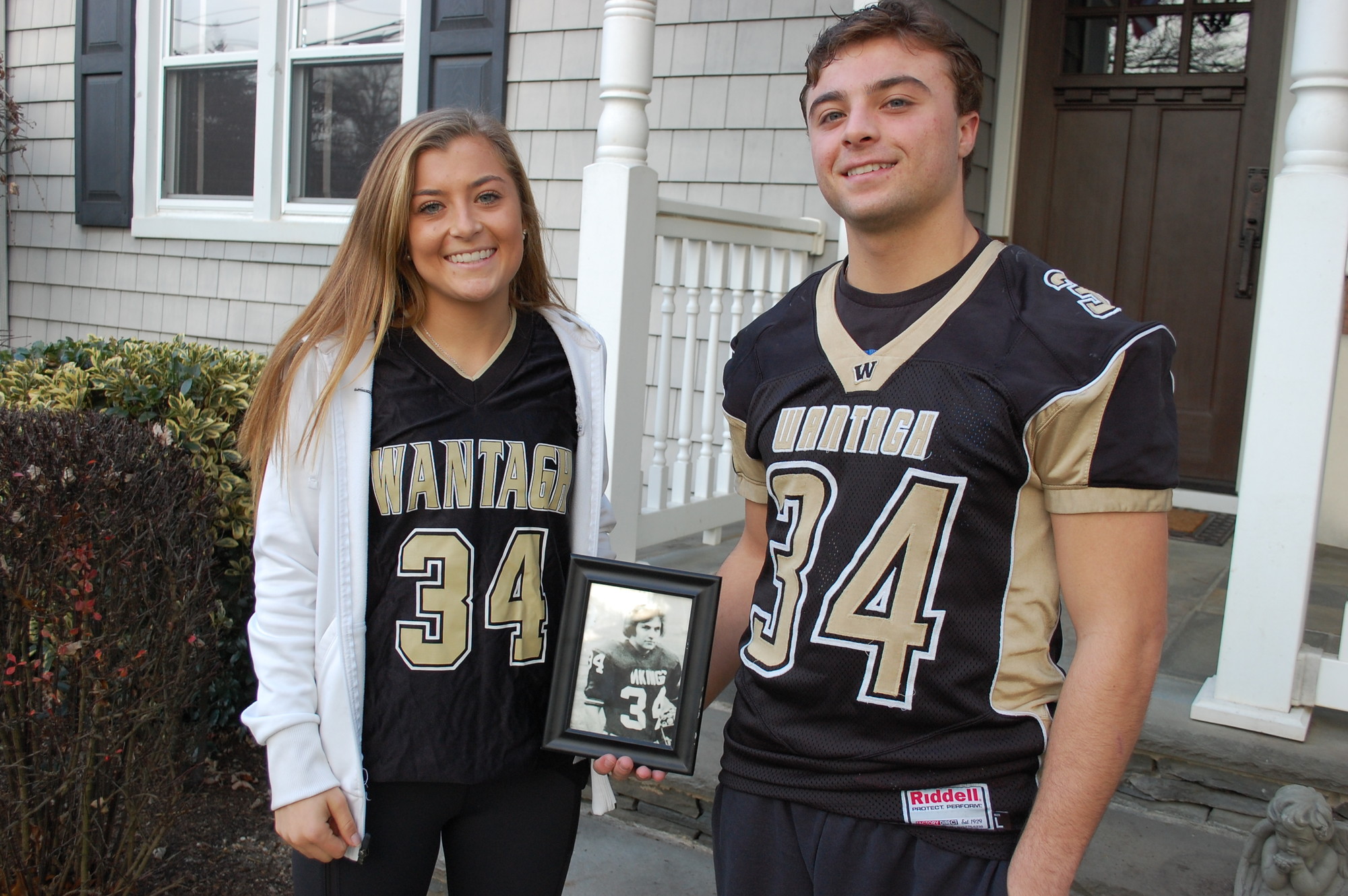 Nikki and Kyle Sliwak, with their choice of uniform number for the Wantagh Warriors, honor their father, Robert, who played football and baseball for the Seaford Vikings, and died on Sept. 11.