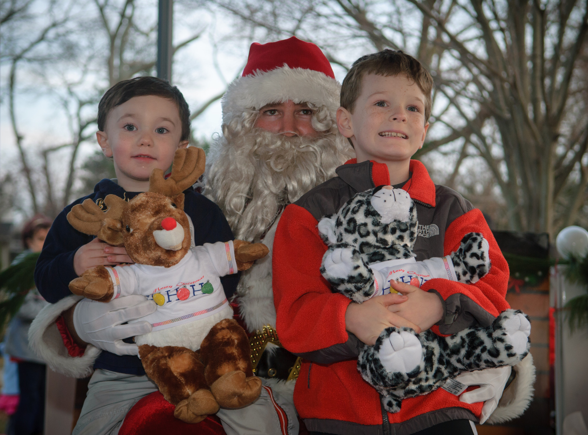 Brendan and Ryan of W. Hempstead visited with Santa after creating their their new stuffed animals at the "stuff-a-bear" table.