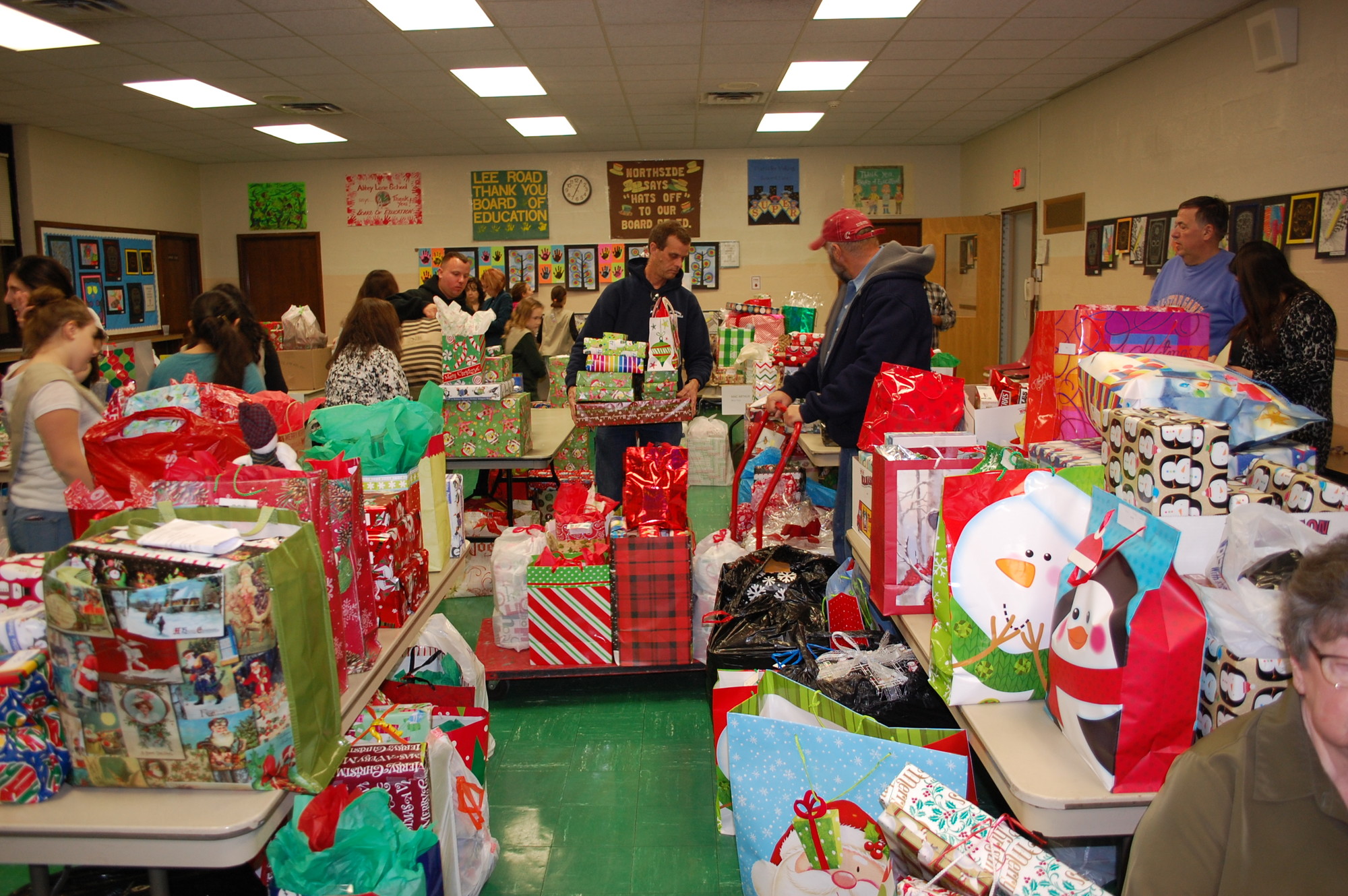 The Board room at the Levittown Memorial Education Center, at left, was filled with gifts on Dec. 15 for needy families in the district.