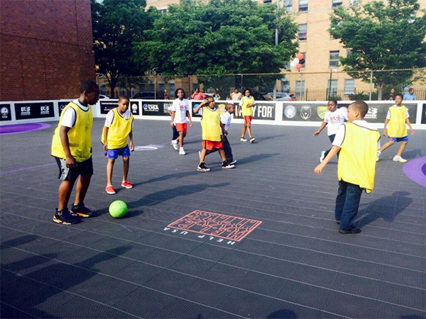 Street Soccer USA transformed an unused parking lot in East New York, Brooklyn into a soccer pitch for the community.