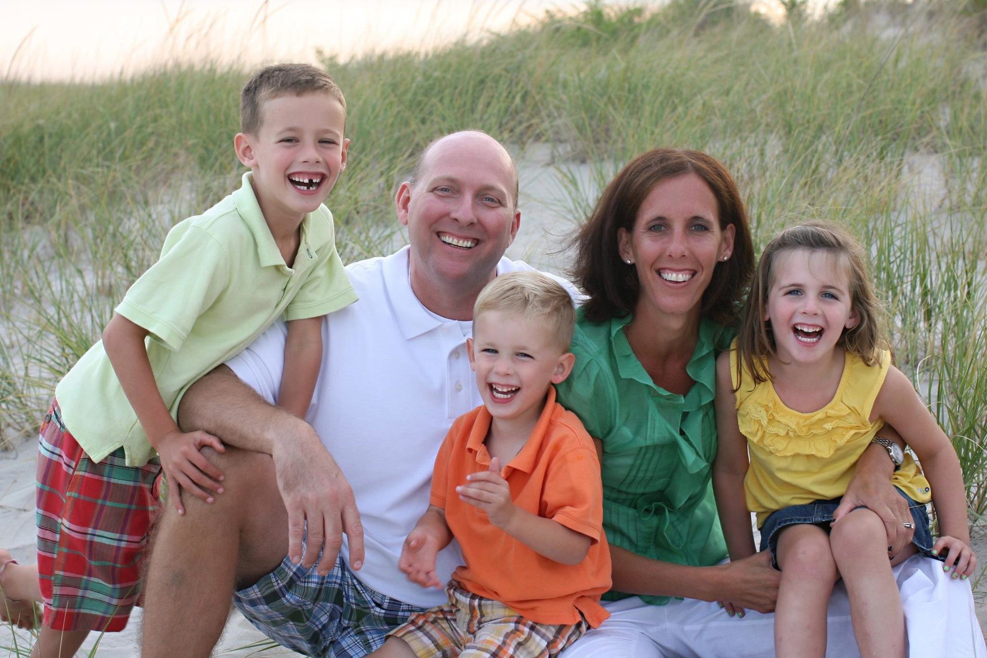 Don Poland and his wife, Cheri, moved to East Rockaway in 2009 with their children Tyler, left, Timothy and Emma