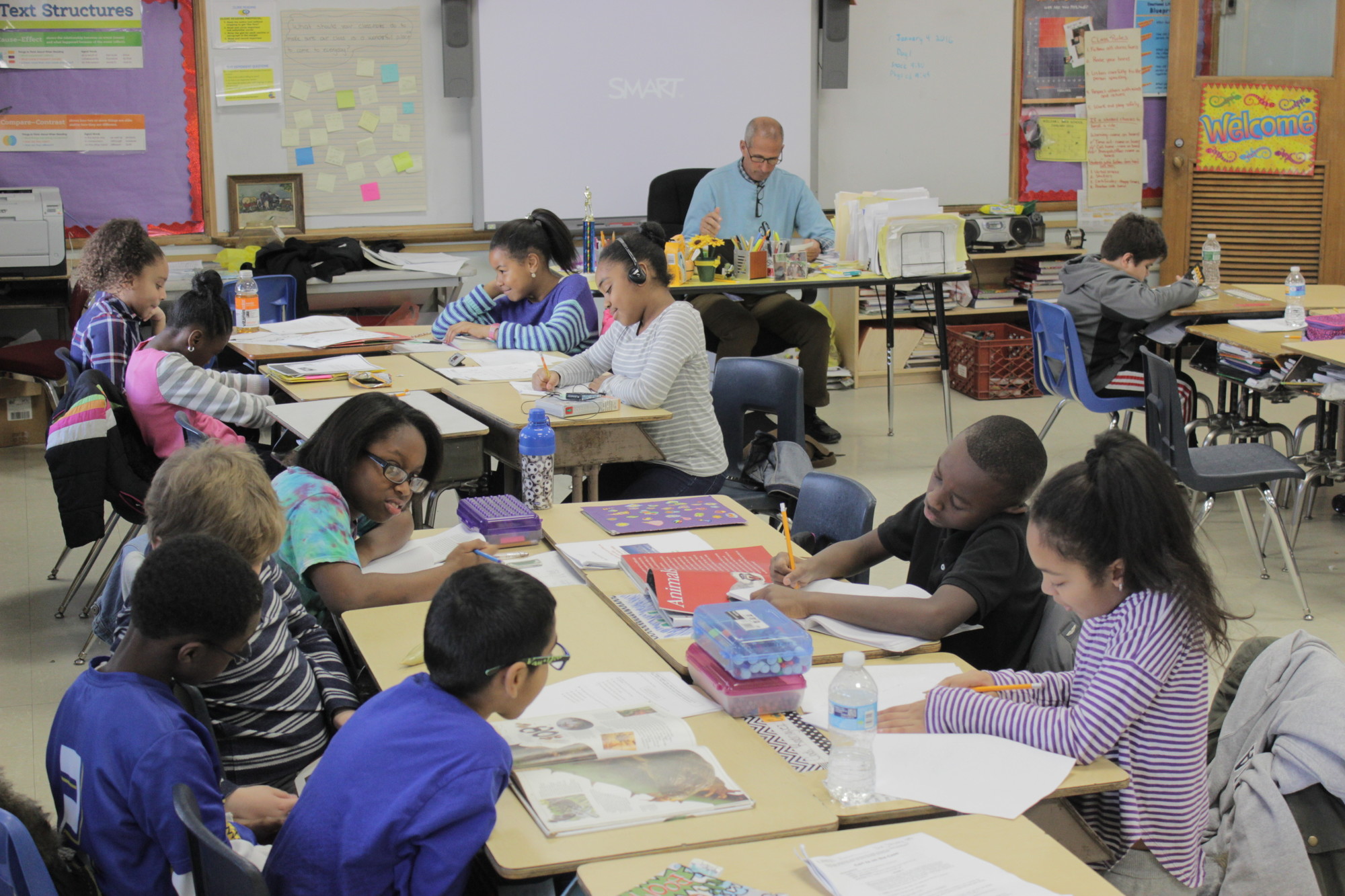 David LeWinter’s fifth grade class at the William L. Buck School has desks arranged in table configurations.