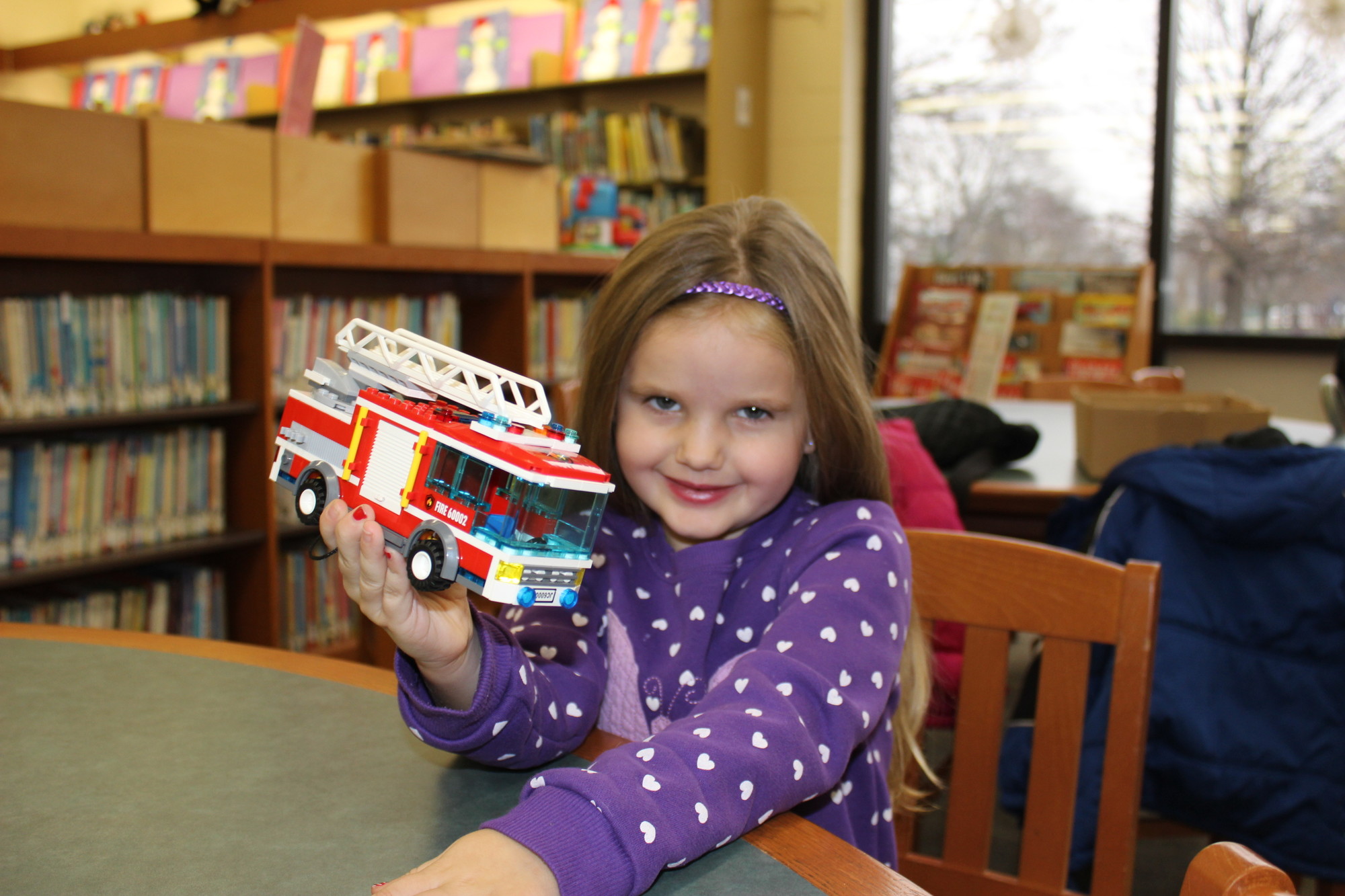 Riley Lahey, 5, built a fire truck in honor of her father, a volunteer firefighter.