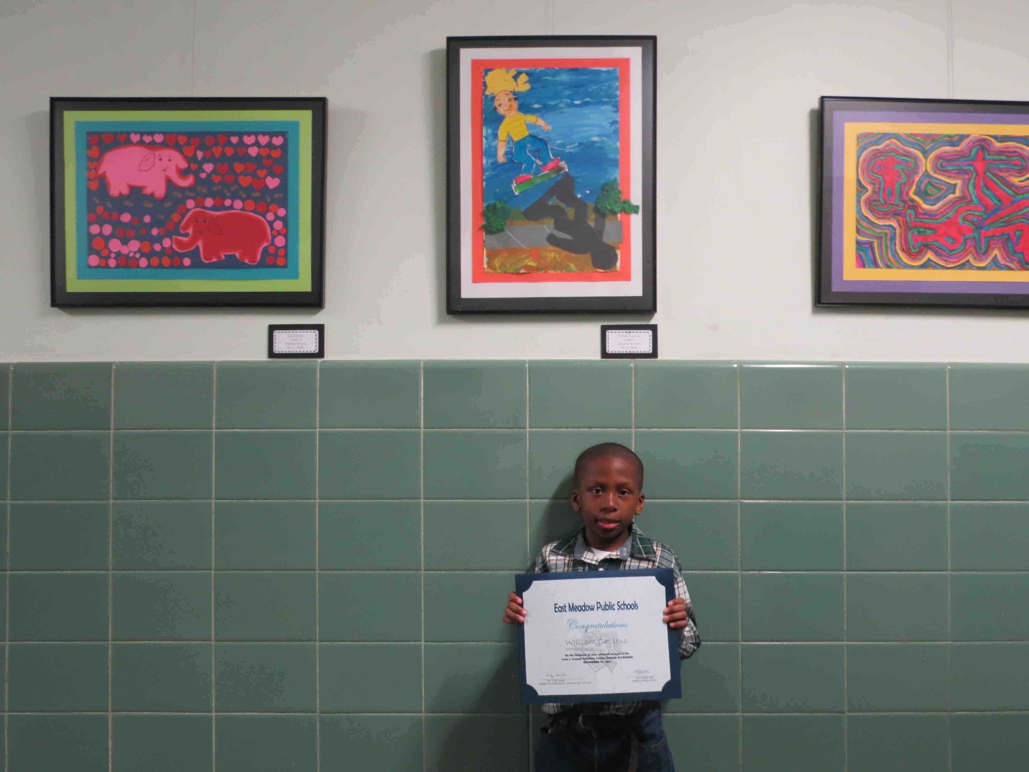Barnum Woods Elementary School third-grader William Casseus was one of the students East Meadow School District officials honored at the art show.