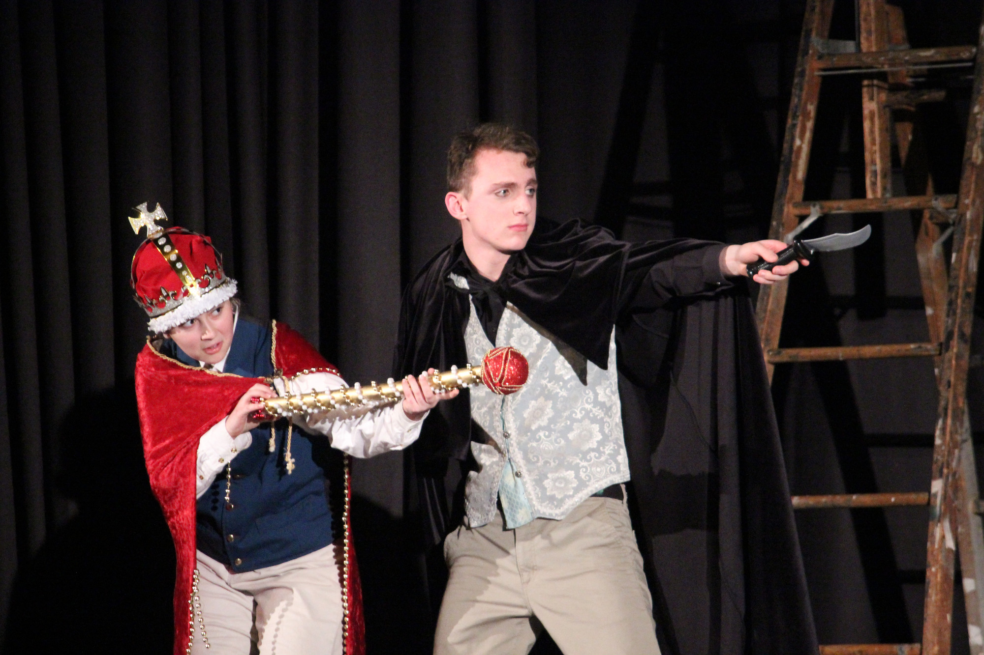 Nadia Tavella, left, and senior Max LoSardo play the King and Hamlet in “The Complete Works of William Shakespeare (Abridged).”