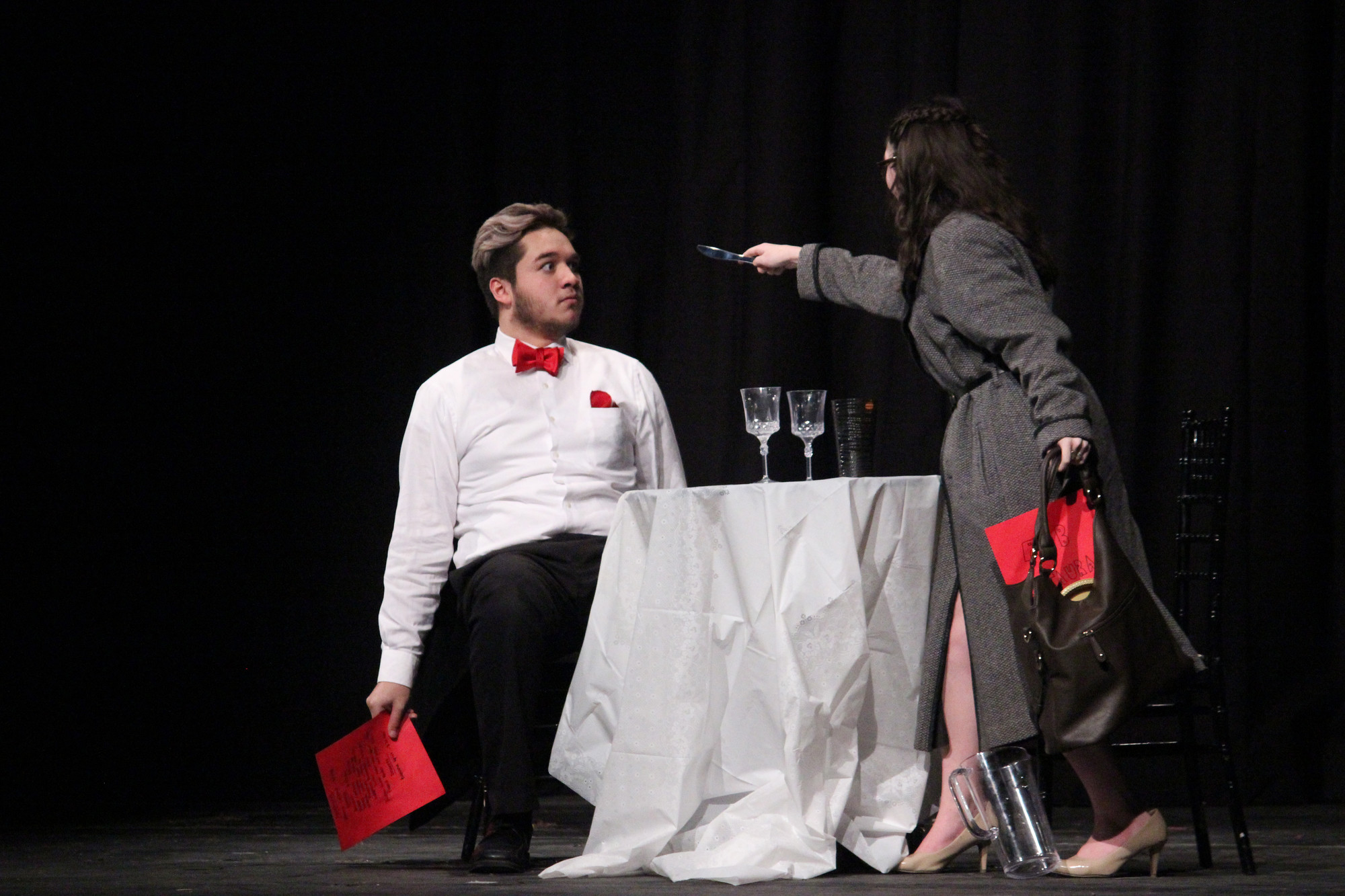 Connor Coniglio is surprised when his date, Isabel Logios, pulls a knife on him during a blind date in “Check, Please.”