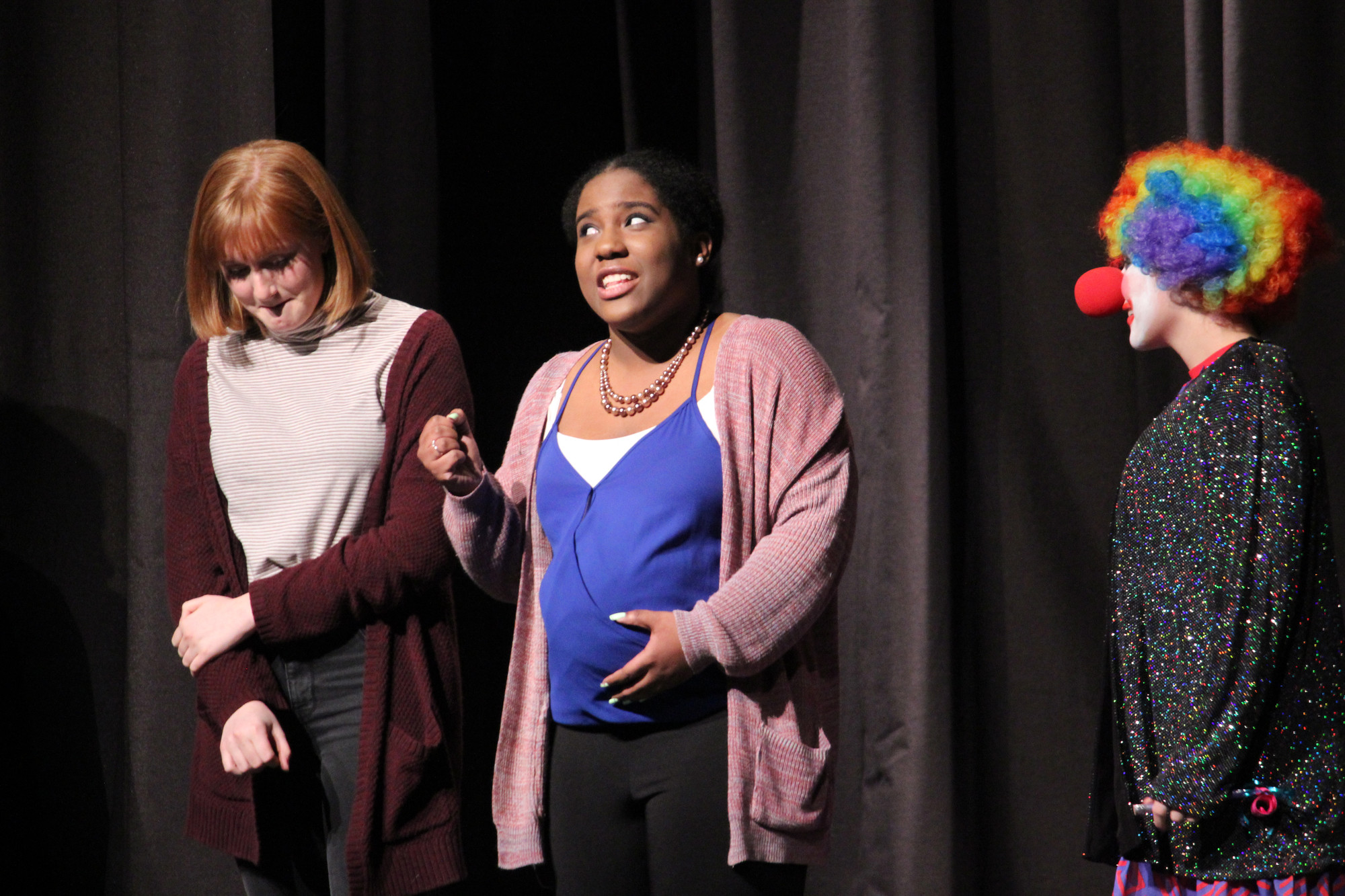 Nathanaah Prophete, center, played a very anxious, very pregnant woman trapped on an elevator with an assortment of characters, such as an instructor, played by Emma Vecchione, left, and a clown, played by Agatha O’Connell.