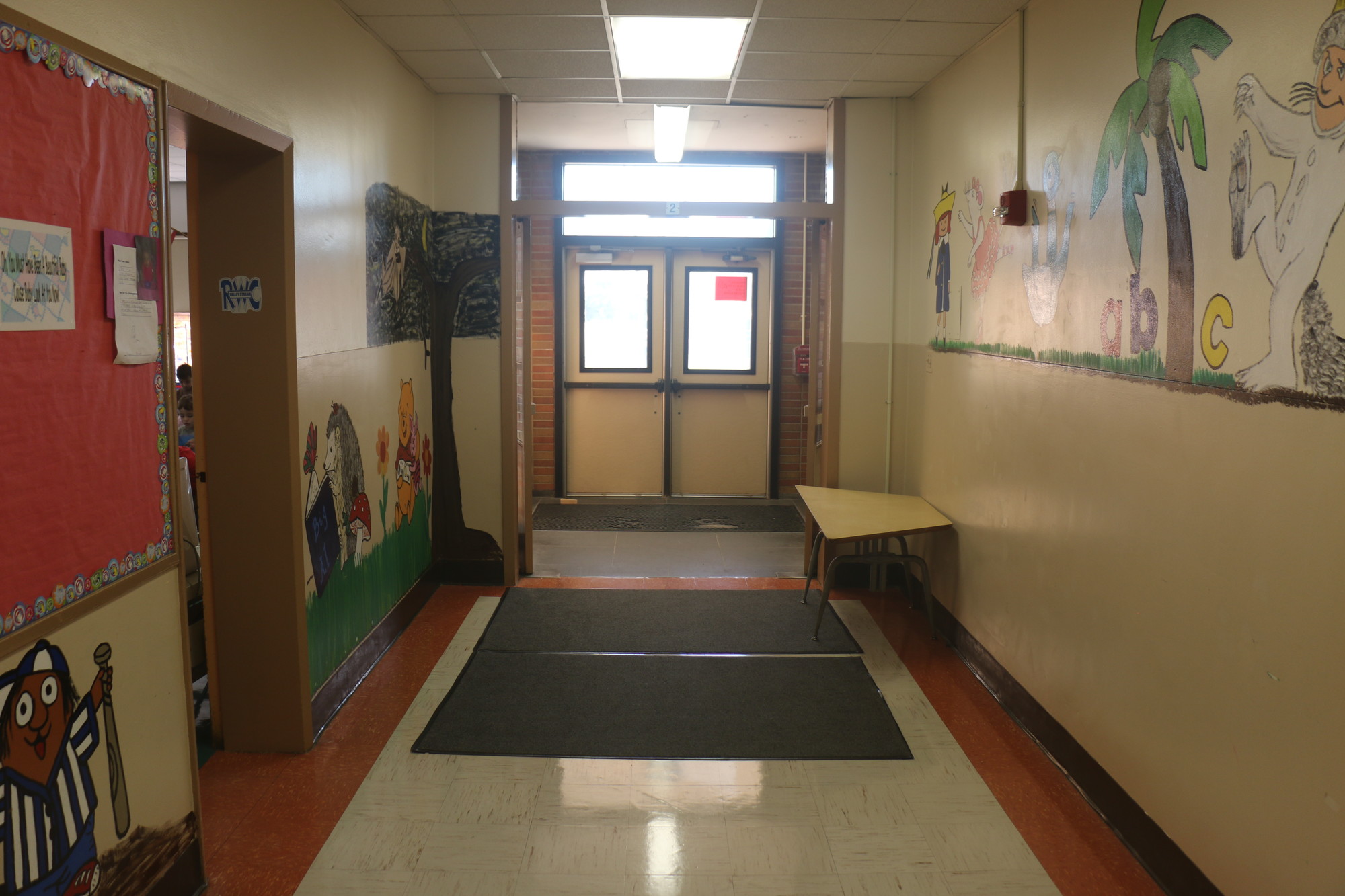 A similar fire exit at the Robert W. Carbonaro School has been converted into an English as a New Language classroom.