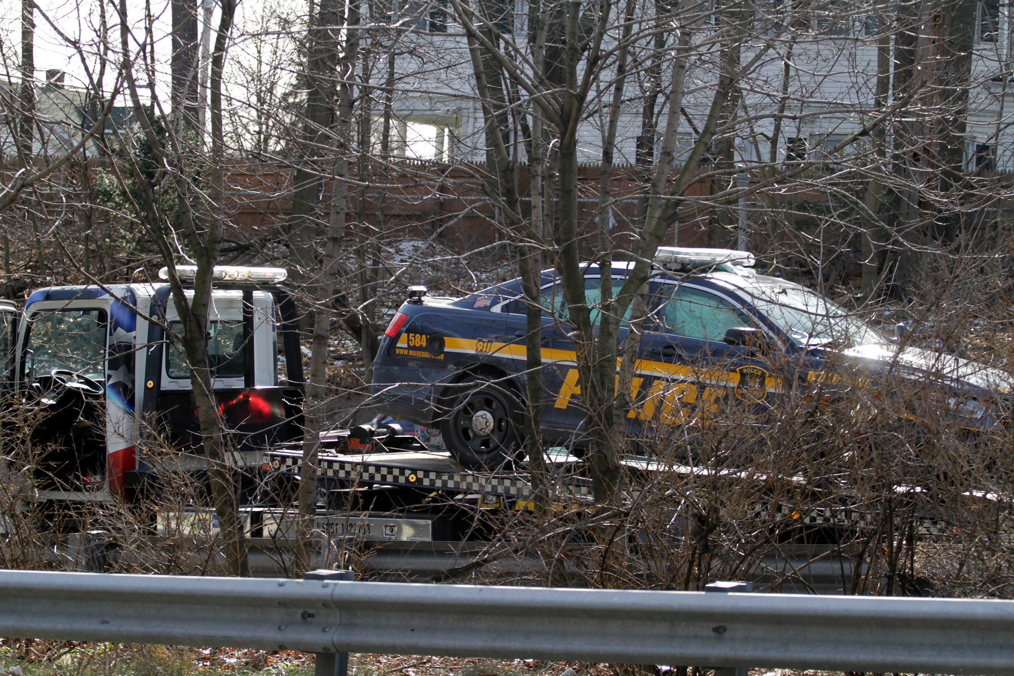 A Malverne police car with deployed airbags was towed from the Southern State Parkway after it hit a guardrail near exit 17N on Jan. 20.