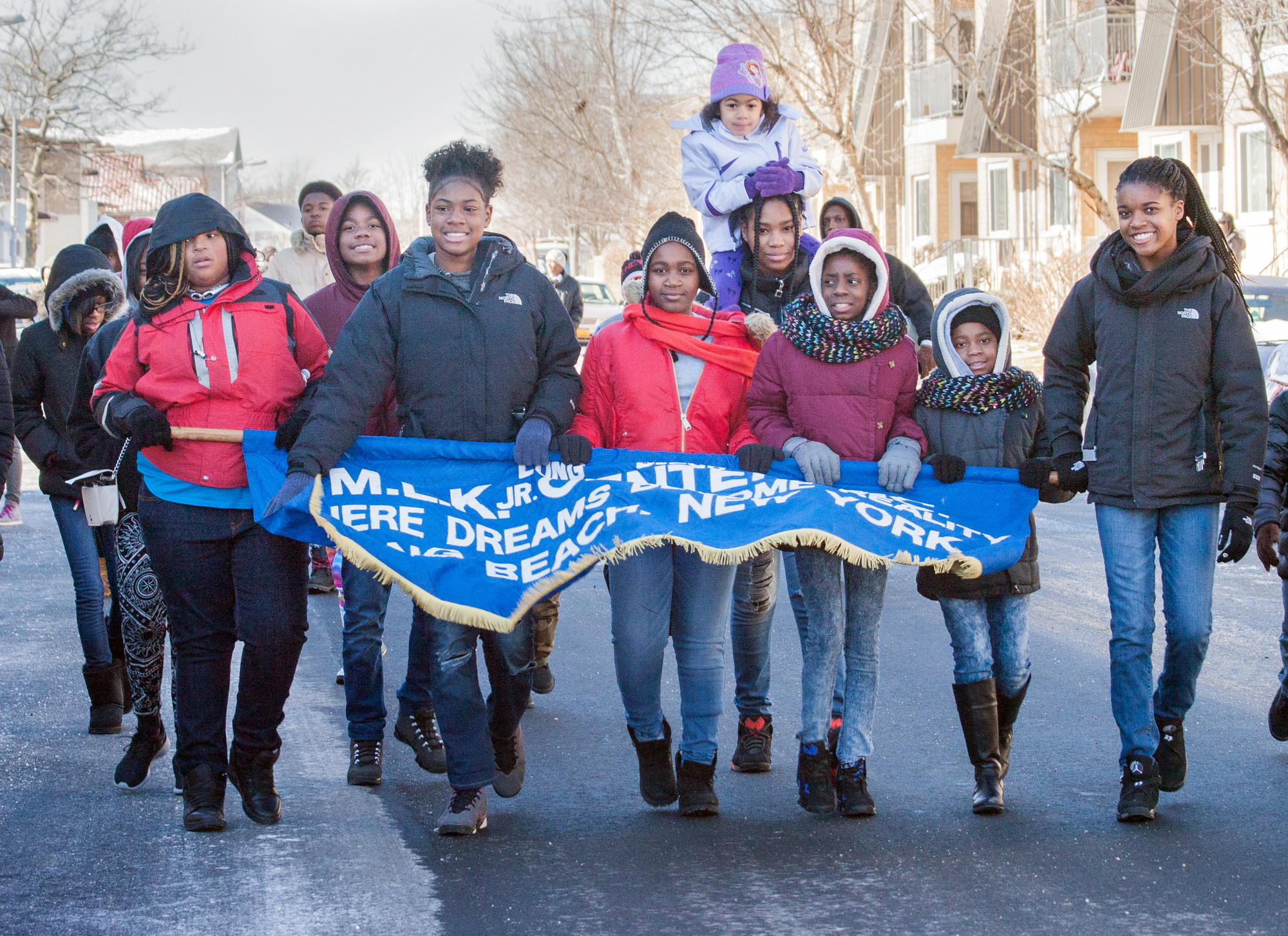 Children marched along the parade route on East Pine Street.