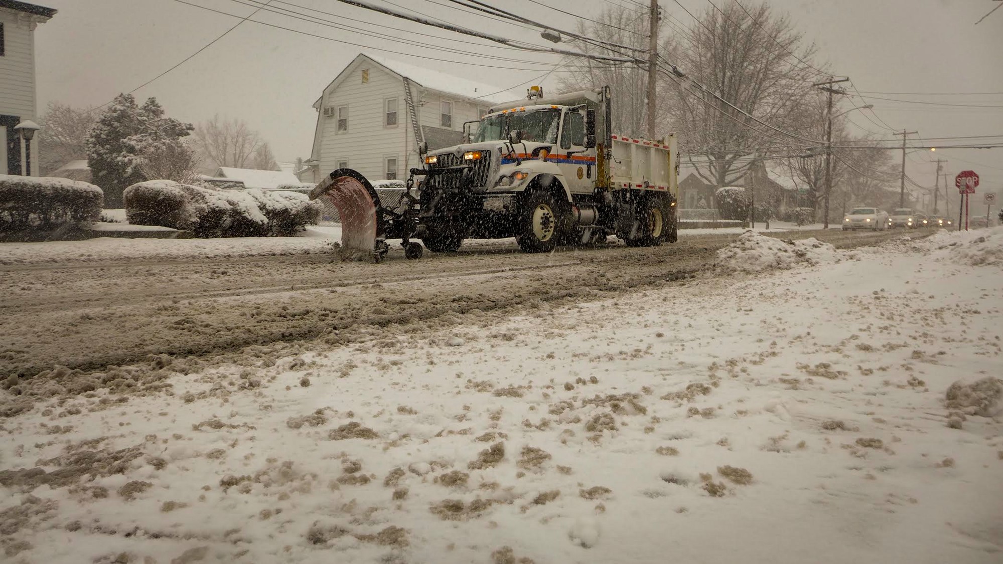 A DPW truck plowed Ocean Avenue in East Rockaway during last year's first winter storm.