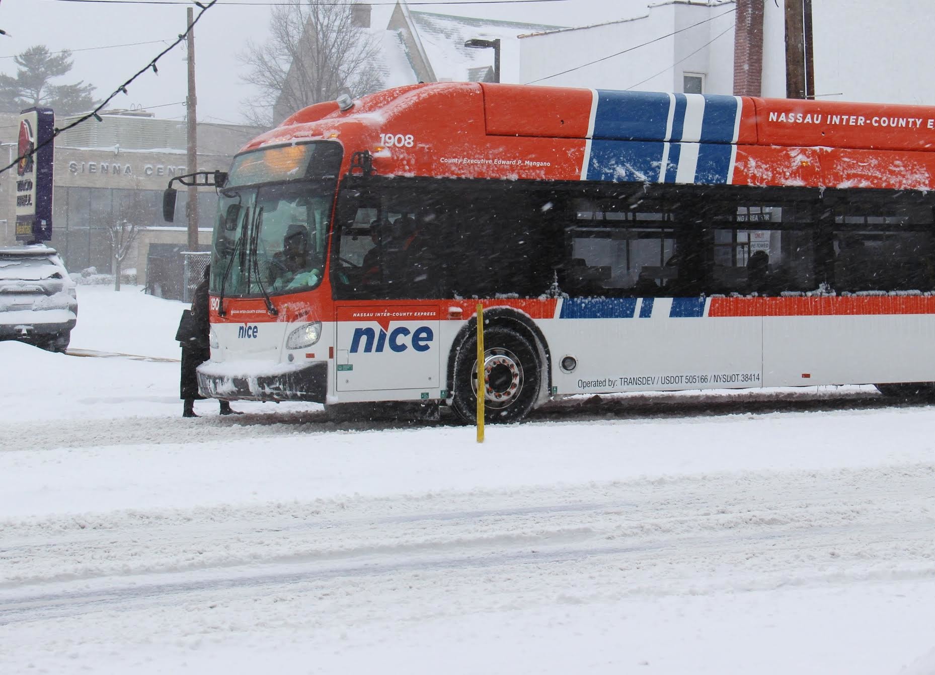 Commuters get on the N6 bus on Hempstead Turnpike in Franklin Square