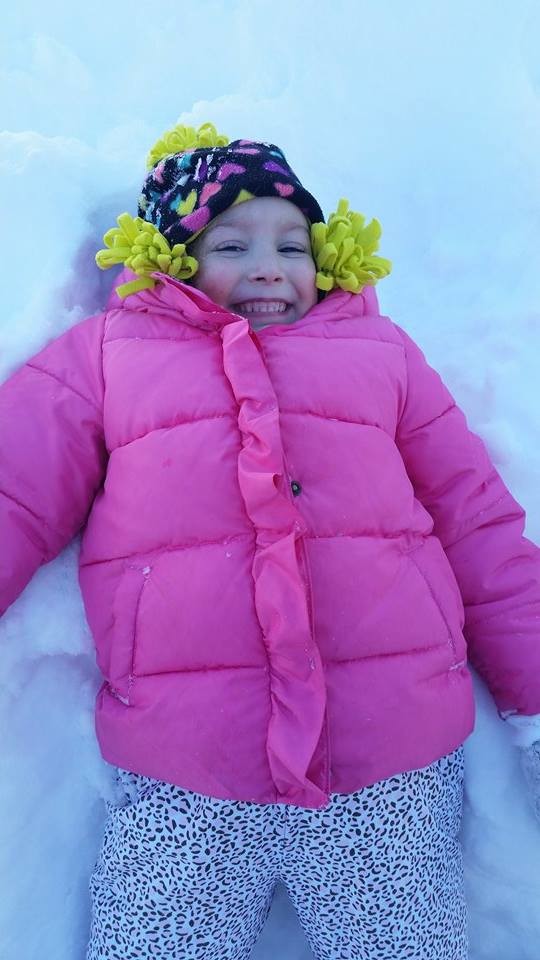 Madison DeVoe, 5, enjoyed the snowfall on Wood Lane in Valley Stream.