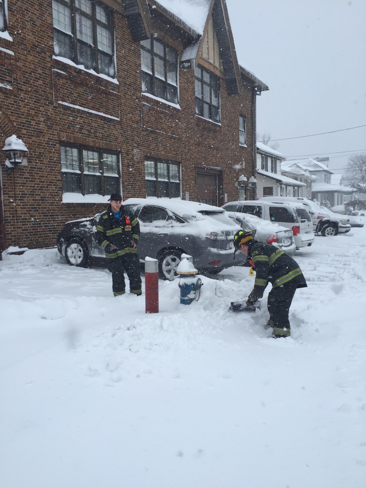 Firefighters cleared fire hydrants across the village in the event of an emergency.