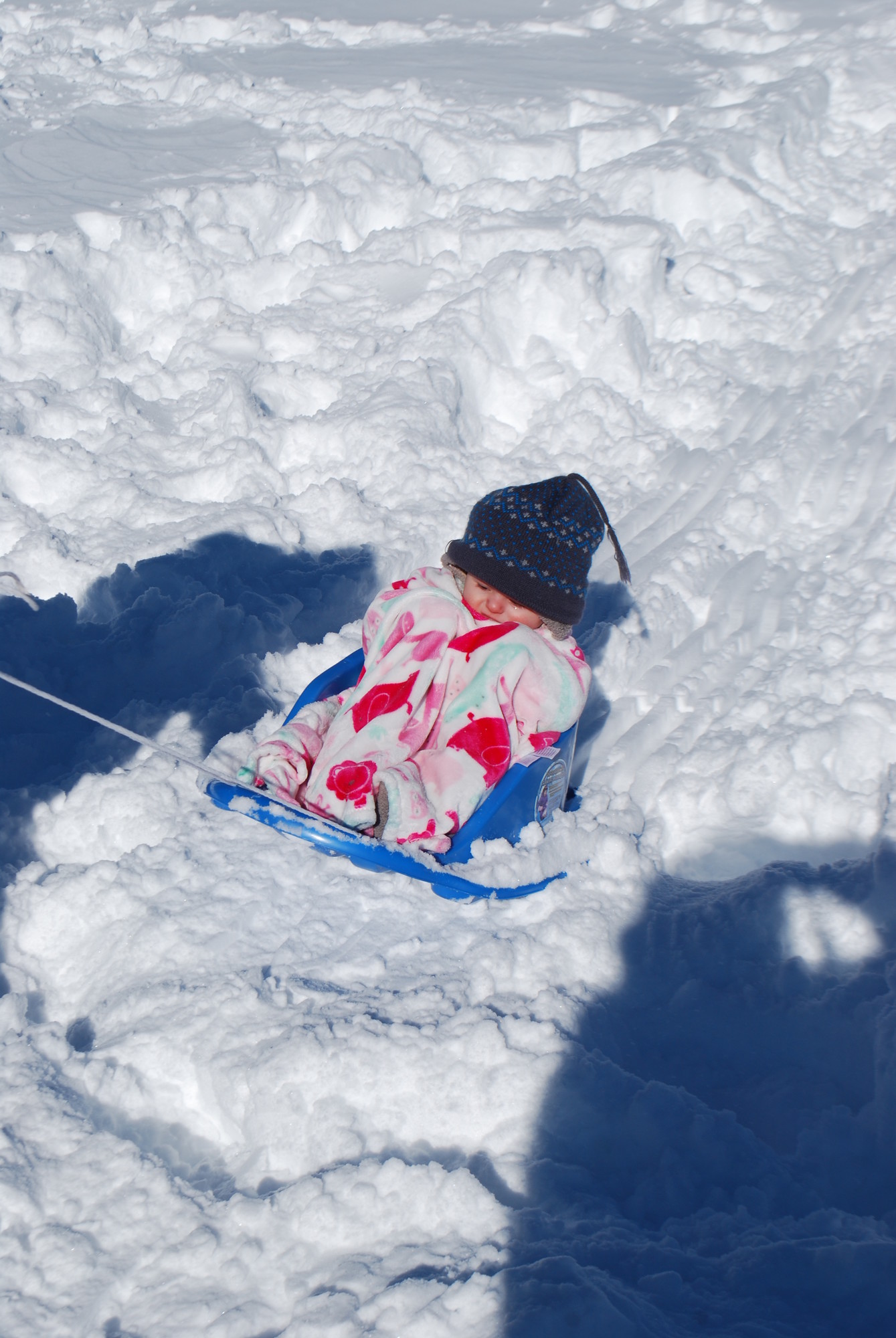 Kasey Lass, 5 months, of Seaford, experienced her first time sledding at Cedar Creek Park.