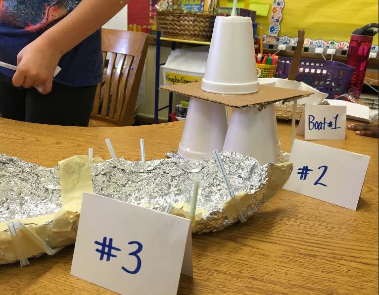 Students built boats to complete the design challenge that was presented to them in STEM lab.