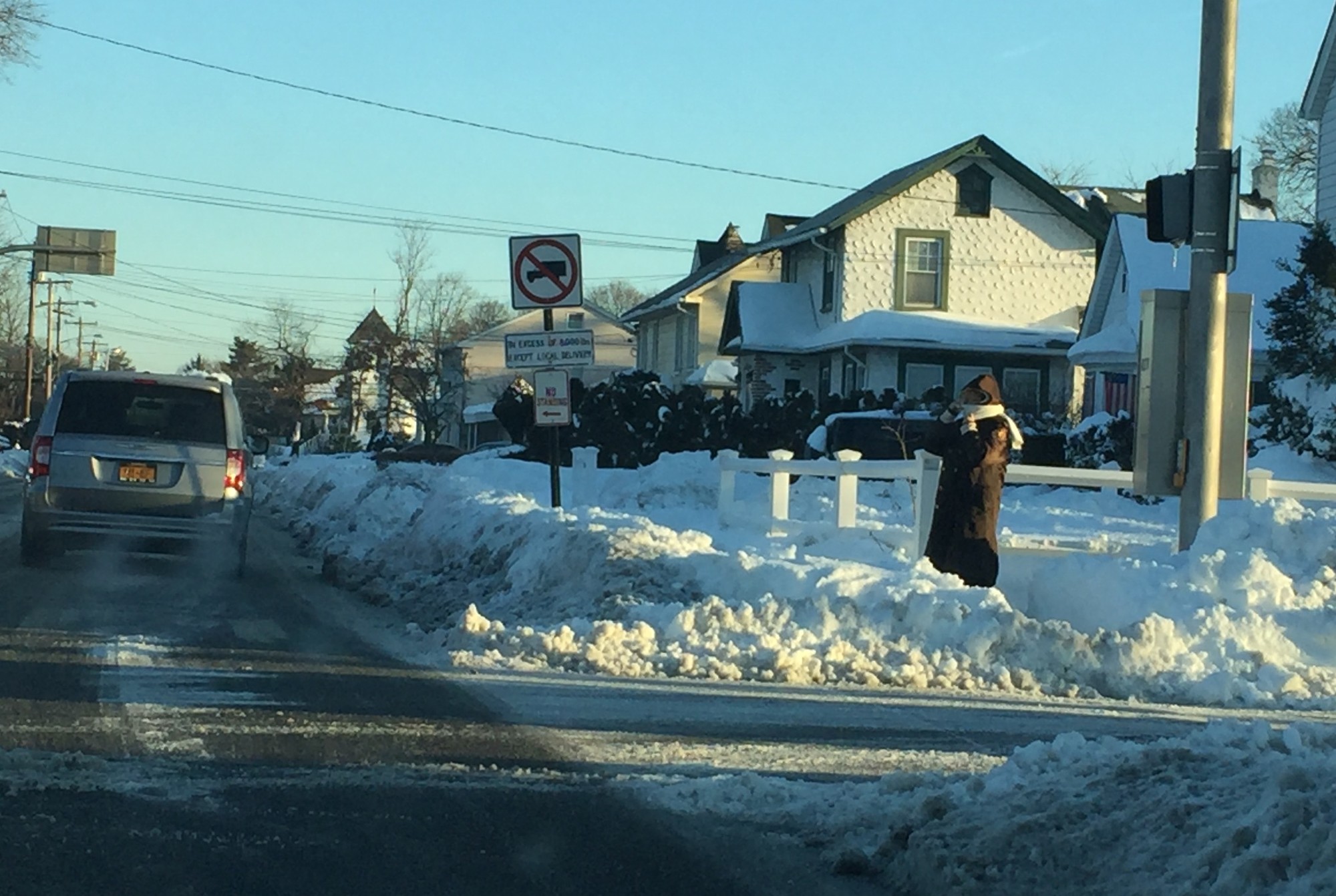 School was open on time in East Rockaway and Lynbrook on Monday morning. Pictured is a very cold crossing guard on Ocean Avenue at 8 a.m.