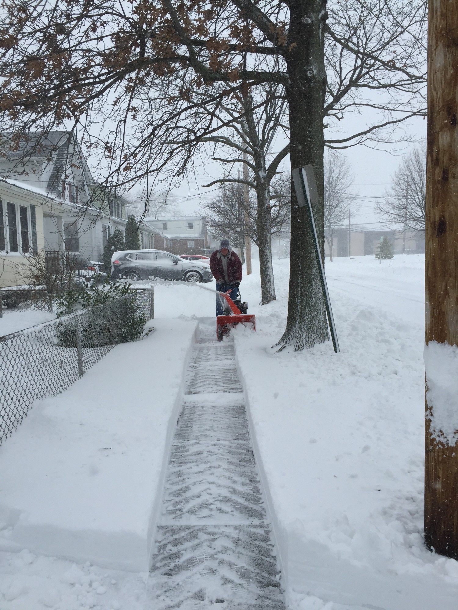 Jim Nicoletti fired up his snow blower on Merton Avenue in Lynbrook Saturday to try to get ahead of the storm.