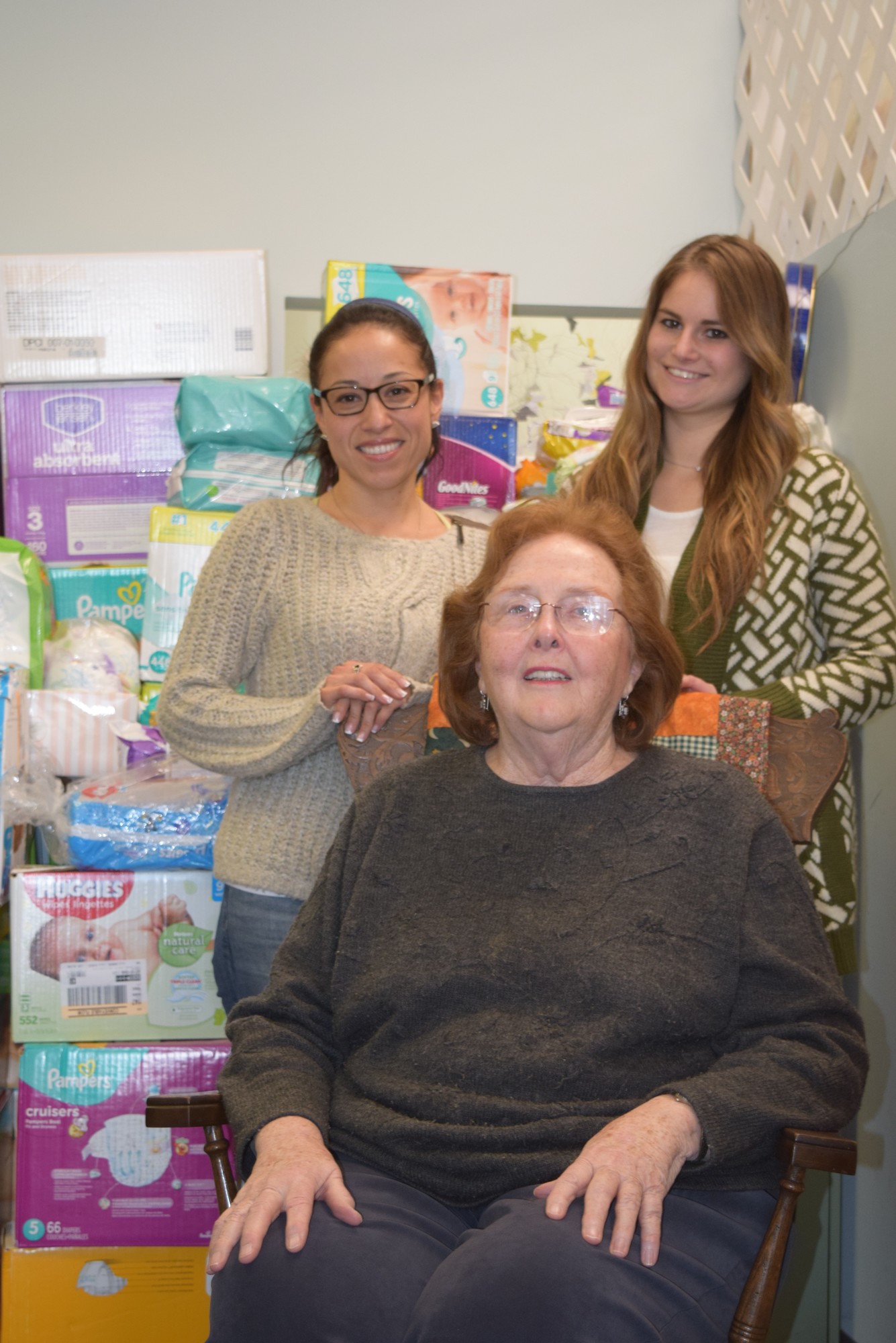 Director Patricia Shea and social workers Daniela Richards, left, and Ashley Loodus help young mothers relocate and become independent through the Mommas House nonprofit organization.