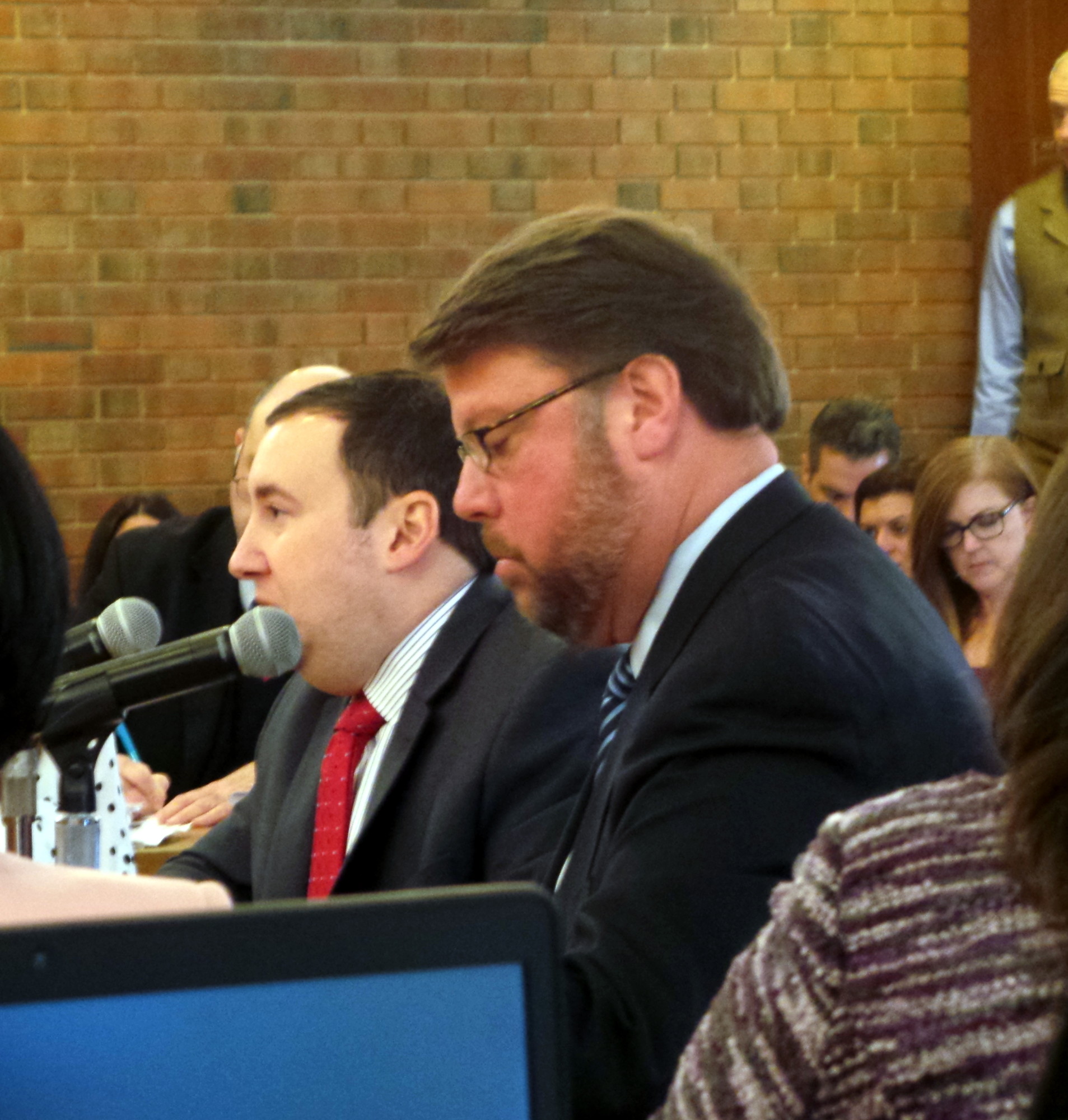 R&B Acquisitions & Development’s lawyer, Dominick Minerva, near right, discussed the developer’s proposed plan.