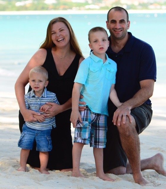 The Roslow family was all smiles at the beach, with 1-year-old James, left; mom, Rachel; 5-year-old Ethan; and dad, Brett. The Roslows have been working to establish a special-needs gym in the Bellmore-Merrick area.