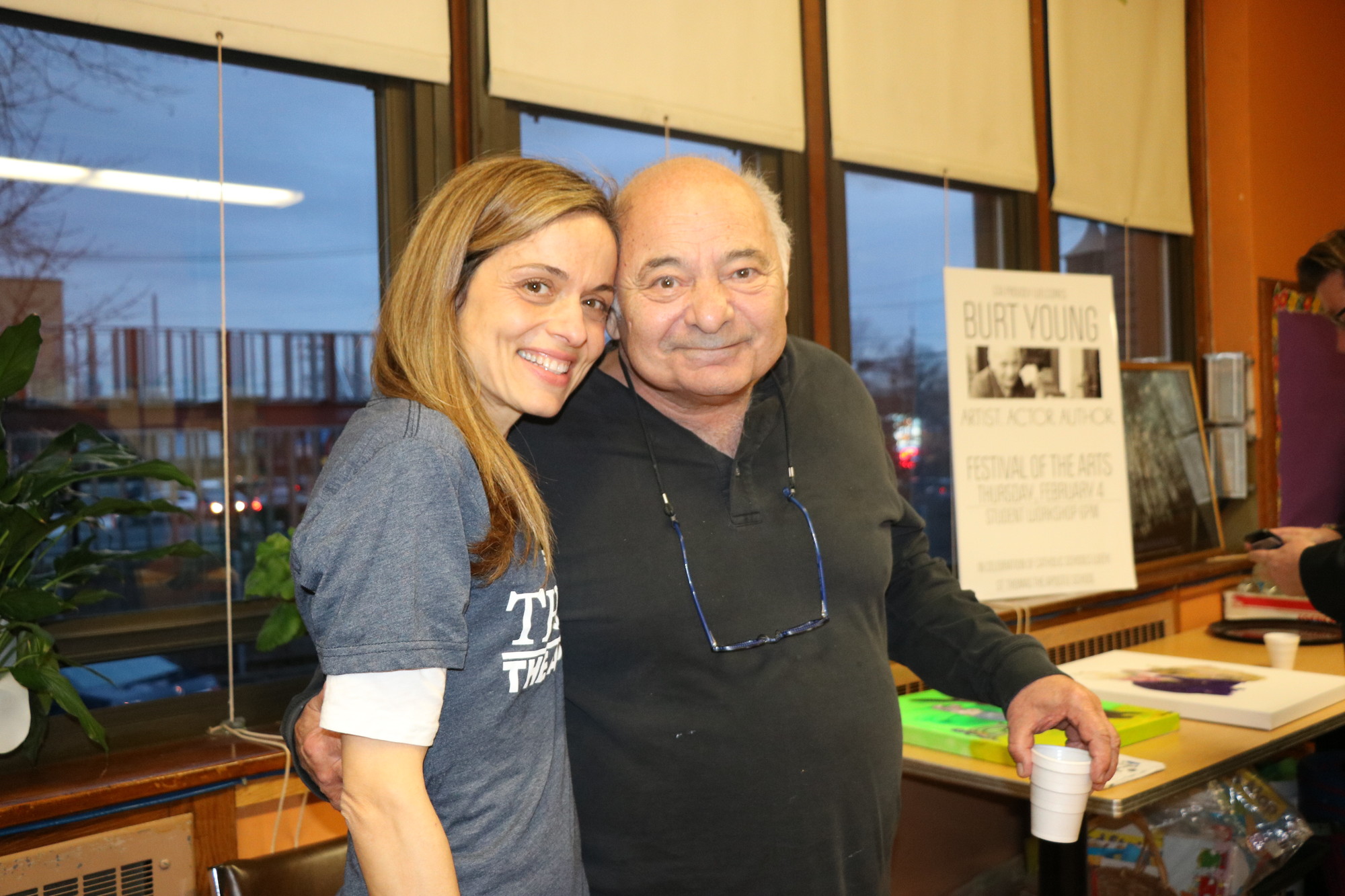 Actor Burt Young with St. Thomas the Apostle teacher Daniela Picone at a painting event at the school on Feb. 4.