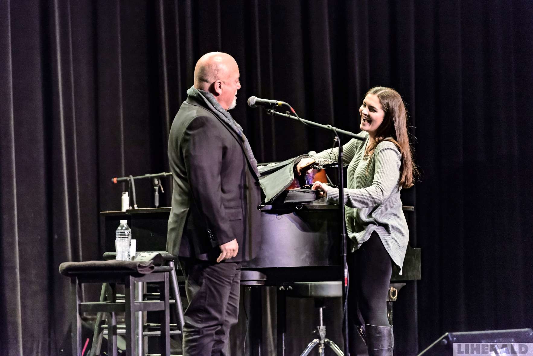 Jillian Rossi, a LIHSA 11th grader who attends JFK High School, played guitar while she sang an original song during Billy Joel’s meeting with students at the Tilles Center for the Performing Arts yesterday.
