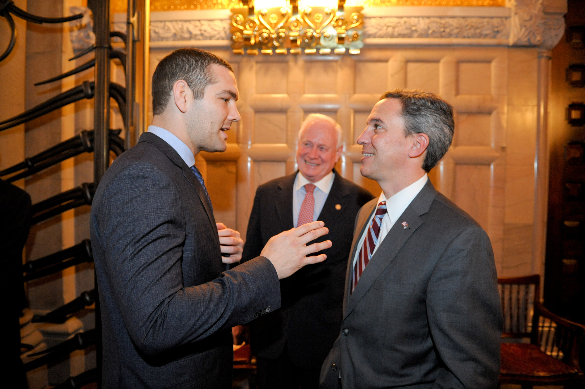 Chris Weidman consulted with Republican Sen. Jack Martins outside the Senate chamber during the last week of January.