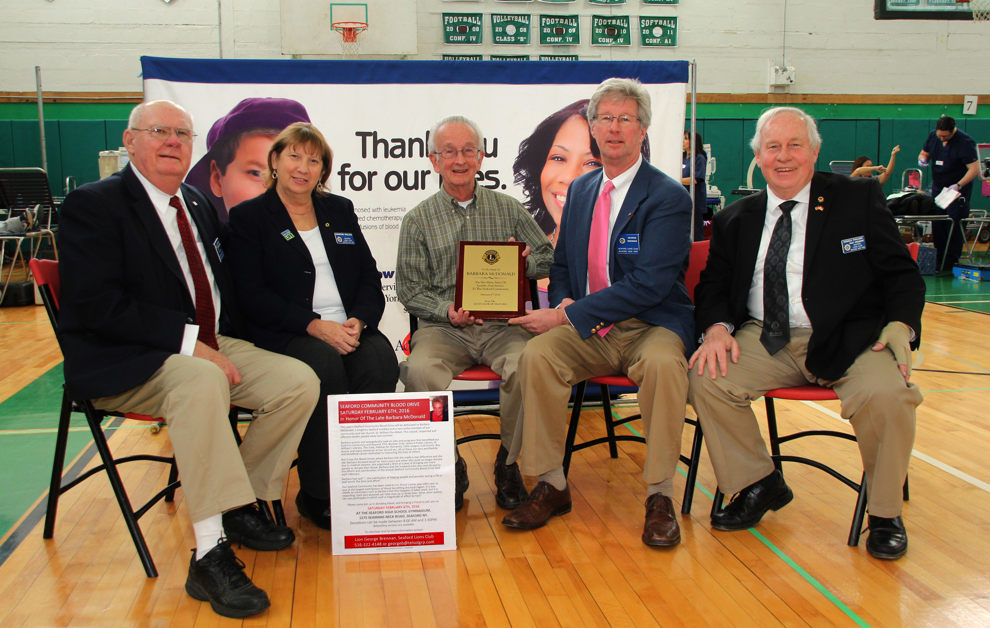 John McDonald, center, received a plaque from the Lions Club of Seaford on behalf of his wife, Barbara, whom this year’s blood drive was dedicated to. From left are Lions Club President Charlie Wroblewski, and Lions Christine Paulson, George Brennan and Donald Paulson.