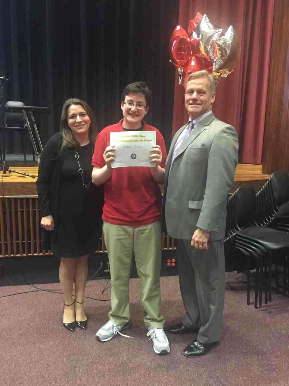 Michael Pincus (center) recently won Woodland’s National Geographic Bee, district officials said.