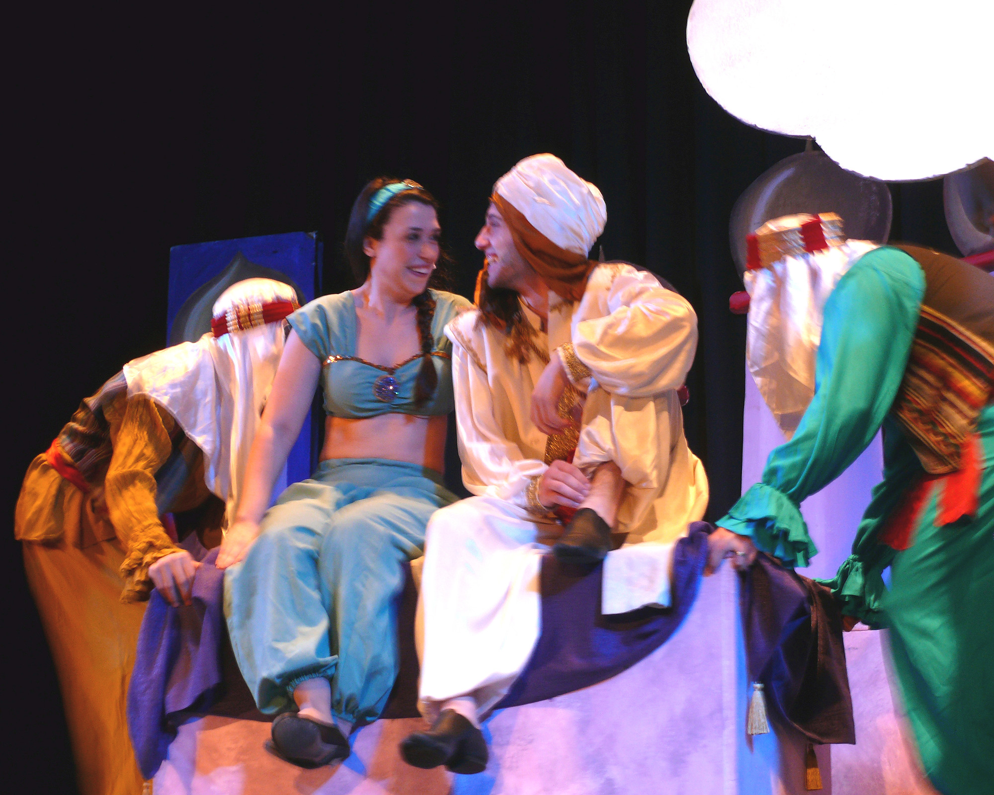 Jasmine and Aladdin take a magic carpet ride.